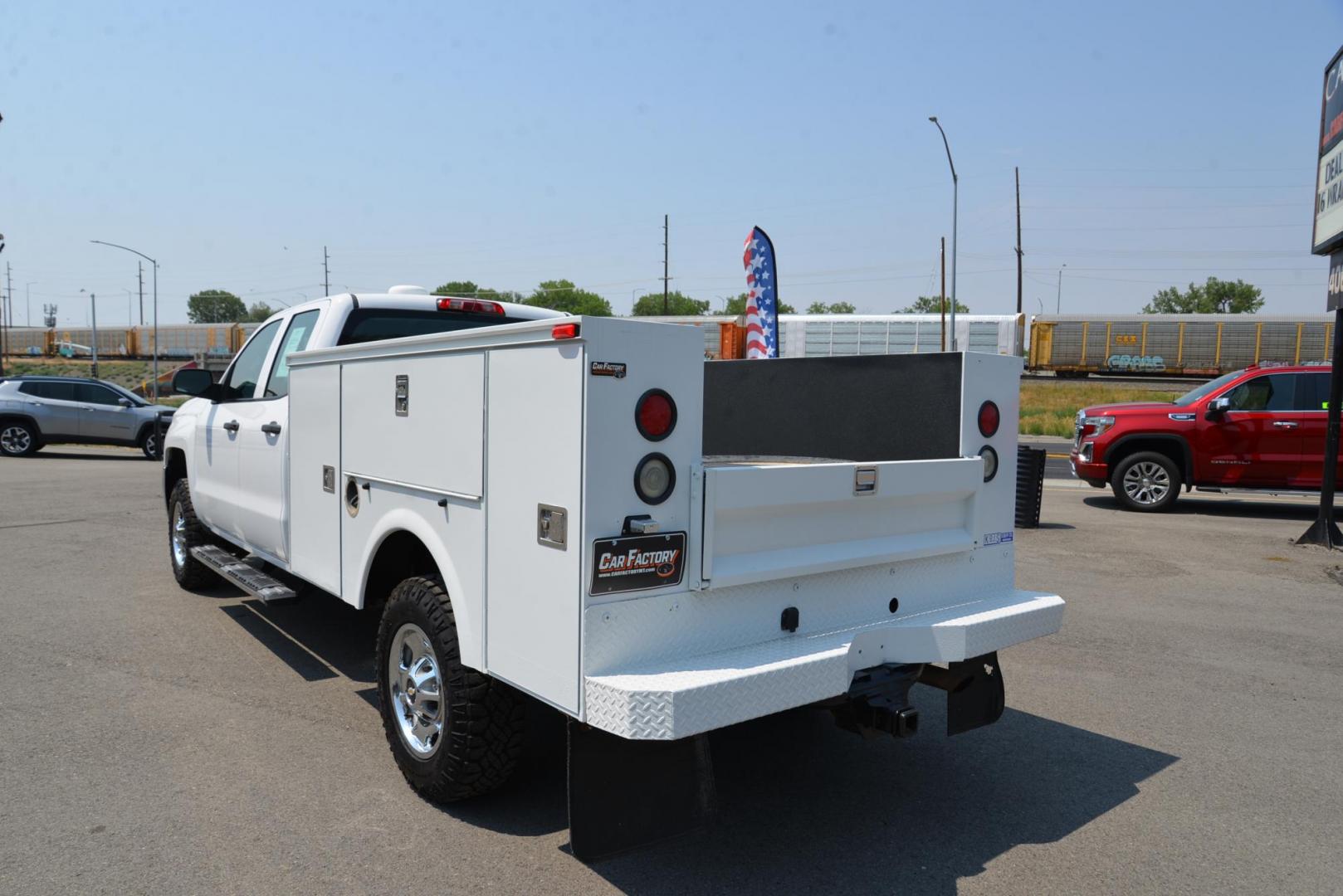 2015 white /Grey Chevrolet Silverado 2500HD Work Truck Double Cab 4WD (1GB2KUEG0FZ) with an 6.0L V8 OHV 16V FFV engine, 6-Speed Automatic transmission, located at 4562 State Avenue, Billings, MT, 59101, (406) 896-9833, 45.769516, -108.526772 - 6.0L V8 OHV 16V FFV Gasoline Engine - 6-Speed Automatic Transmission - 4WD - 149,510 miles - One owner - Inspected and serviced - Copy of inspection and work performed as well as full history report provided! Work Truck Package - air conditioning - tilt steering wheel - cruise control - AM/FM aud - Photo#3