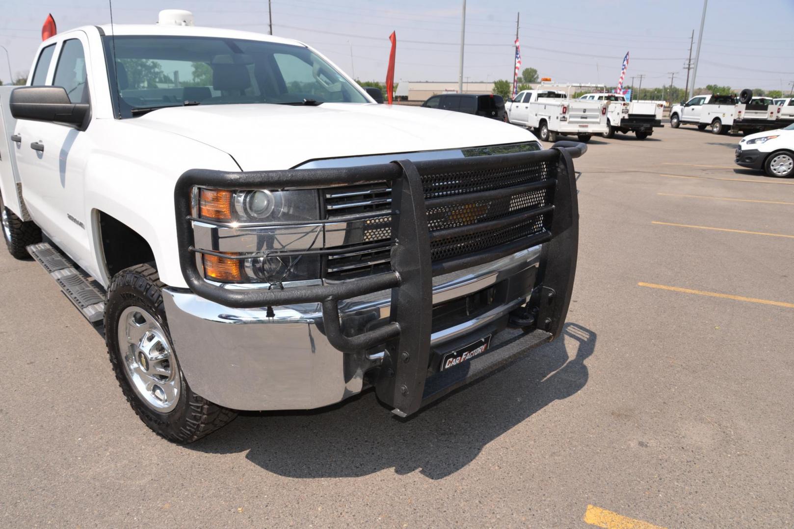 2015 white /Grey Chevrolet Silverado 2500HD Work Truck Double Cab 4WD (1GB2KUEG0FZ) with an 6.0L V8 OHV 16V FFV engine, 6-Speed Automatic transmission, located at 4562 State Avenue, Billings, MT, 59101, (406) 896-9833, 45.769516, -108.526772 - 6.0L V8 OHV 16V FFV Gasoline Engine - 6-Speed Automatic Transmission - 4WD - 149,510 miles - One owner - Inspected and serviced - Copy of inspection and work performed as well as full history report provided! Work Truck Package - air conditioning - tilt steering wheel - cruise control - AM/FM aud - Photo#21