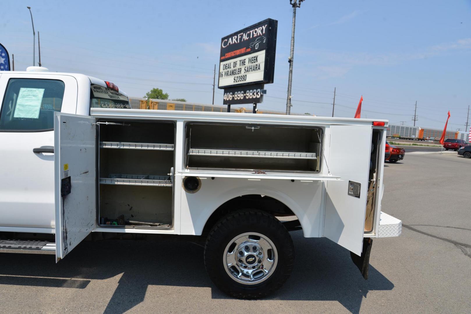 2015 white /Grey Chevrolet Silverado 2500HD Work Truck Double Cab 4WD (1GB2KUEG0FZ) with an 6.0L V8 OHV 16V FFV engine, 6-Speed Automatic transmission, located at 4562 State Avenue, Billings, MT, 59101, (406) 896-9833, 45.769516, -108.526772 - 6.0L V8 OHV 16V FFV Gasoline Engine - 6-Speed Automatic Transmission - 4WD - 149,510 miles - One owner - Inspected and serviced - Copy of inspection and work performed as well as full history report provided! Work Truck Package - air conditioning - tilt steering wheel - cruise control - AM/FM aud - Photo#6