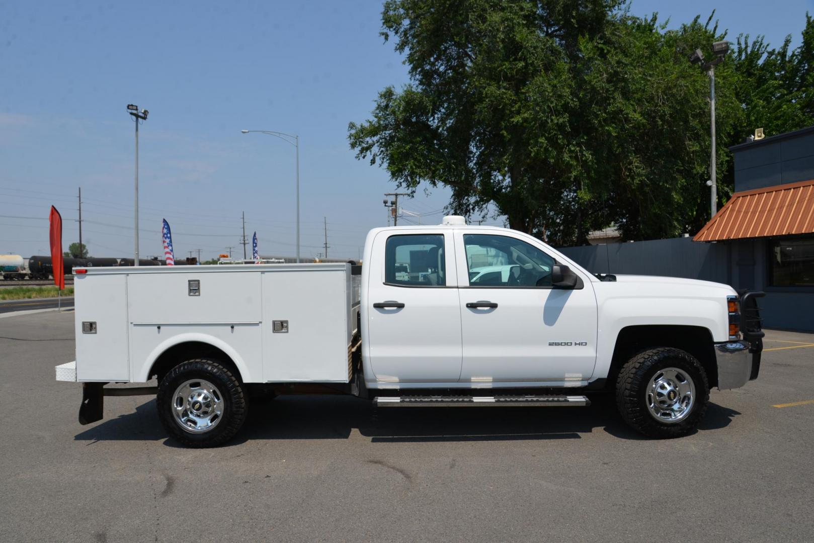 2015 white /Grey Chevrolet Silverado 2500HD Work Truck Double Cab 4WD (1GB2KUEG0FZ) with an 6.0L V8 OHV 16V FFV engine, 6-Speed Automatic transmission, located at 4562 State Avenue, Billings, MT, 59101, (406) 896-9833, 45.769516, -108.526772 - 6.0L V8 OHV 16V FFV Gasoline Engine - 6-Speed Automatic Transmission - 4WD - 149,510 miles - One owner - Inspected and serviced - Copy of inspection and work performed as well as full history report provided! Work Truck Package - air conditioning - tilt steering wheel - cruise control - AM/FM aud - Photo#10