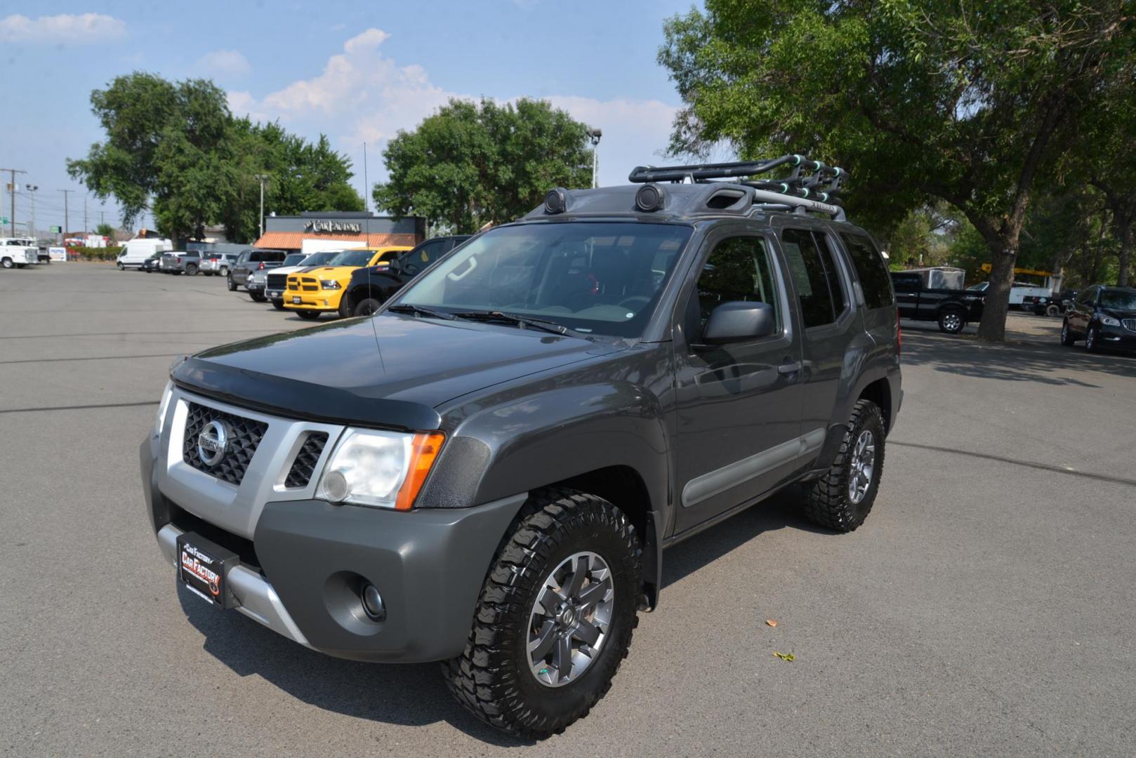 2014 gray /Grey Nissan Xterra Pro-4X (5N1AN0NW8EN) with an 4.0L V6 DOHC 24V engine, 5-Speed Automatic transmission, located at 4562 State Avenue, Billings, MT, 59101, (406) 896-9833, 45.769516, -108.526772 - 2014 Nissan Xterra Pro 4X 4x4 This Nissan is a 2 Owner vehicle and was locally traded in. There are no accidents reported on the history report. It has only 105000 miles. The Tires are like new, and they are 16 inch MTX Mud Claw Tires. You can tell this SUV has been cared for as it is in very nice - Photo#3