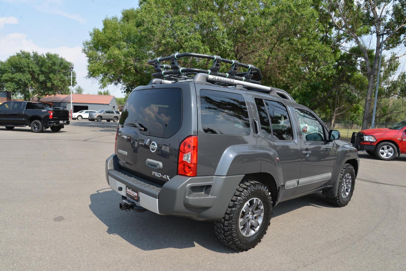 2014 gray /Grey Nissan Xterra Pro-4X (5N1AN0NW8EN) with an 4.0L V6 DOHC 24V engine, 5-Speed Automatic transmission, located at 4562 State Avenue, Billings, MT, 59101, (406) 896-9833, 45.769516, -108.526772 - 2014 Nissan Xterra Pro 4X 4x4 This Nissan is a 2 Owner vehicle and was locally traded in. There are no accidents reported on the history report. It has only 105000 miles. The Tires are like new, and they are 16 inch MTX Mud Claw Tires. You can tell this SUV has been cared for as it is in very nice - Photo#16