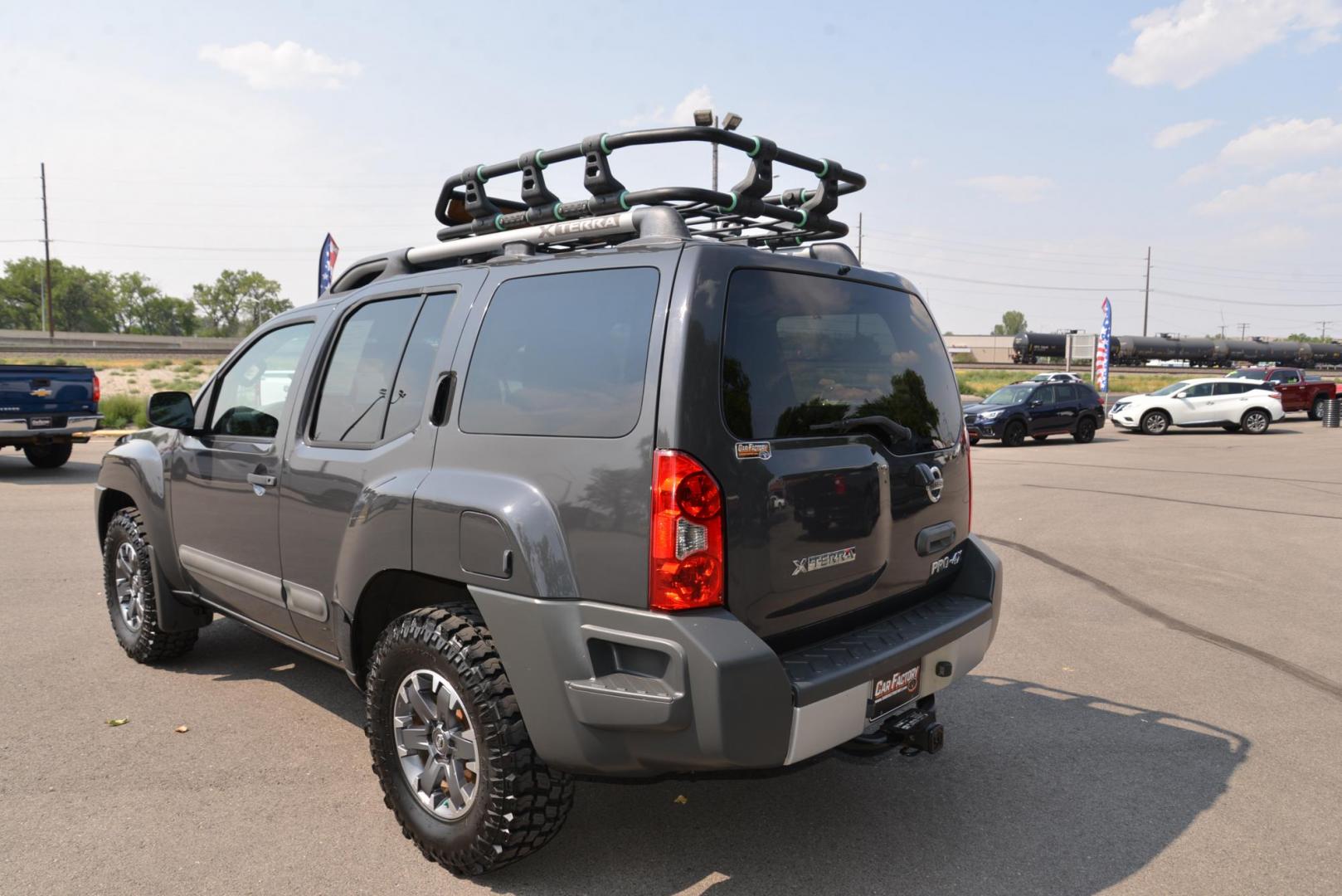 2014 gray /Grey Nissan Xterra Pro-4X (5N1AN0NW8EN) with an 4.0L V6 DOHC 24V engine, 5-Speed Automatic transmission, located at 4562 State Avenue, Billings, MT, 59101, (406) 896-9833, 45.769516, -108.526772 - Photo#4