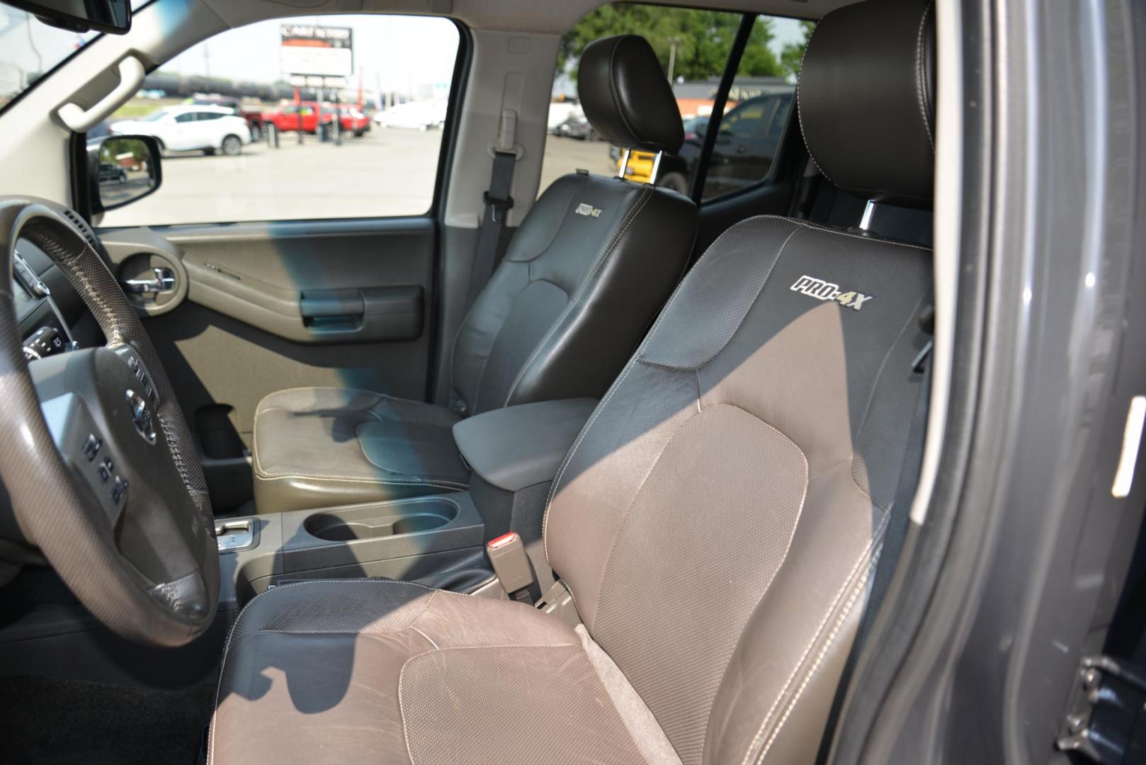 2014 gray /Grey Nissan Xterra Pro-4X (5N1AN0NW8EN) with an 4.0L V6 DOHC 24V engine, 5-Speed Automatic transmission, located at 4562 State Avenue, Billings, MT, 59101, (406) 896-9833, 45.769516, -108.526772 - 2014 Nissan Xterra Pro 4X 4x4 This Nissan is a 2 Owner vehicle and was locally traded in. There are no accidents reported on the history report. It has only 105000 miles. The Tires are like new, and they are 16 inch MTX Mud Claw Tires. You can tell this SUV has been cared for as it is in very nice - Photo#5