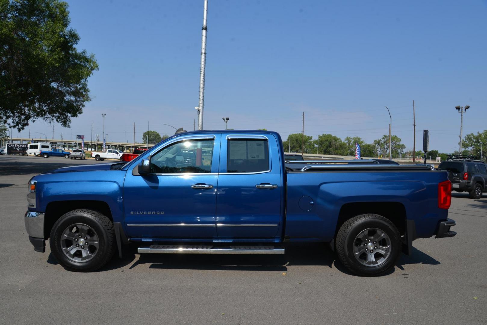 2016 Blue /Black Chevrolet Silverado 1500 LTZ Double Cab Short Box 4WD (1GCVKSEC0GZ) with an 5.3L V8 OHV 16V engine, 6 speed automatic transmission, located at 4562 State Avenue, Billings, MT, 59101, (406) 896-9833, 45.769516, -108.526772 - 2016 Chevy Silverado 1500 double Cab 4x4 LTZ This Chevy is very Clean, The history report shows its a 1 Owner Truck with no accidents reported. This Truck has low miles, It Runs and drives nicely and the tires are in next to new condition. it has a 5.3 Liter V8, 6 Speed automatic transmission, 3. - Photo#2