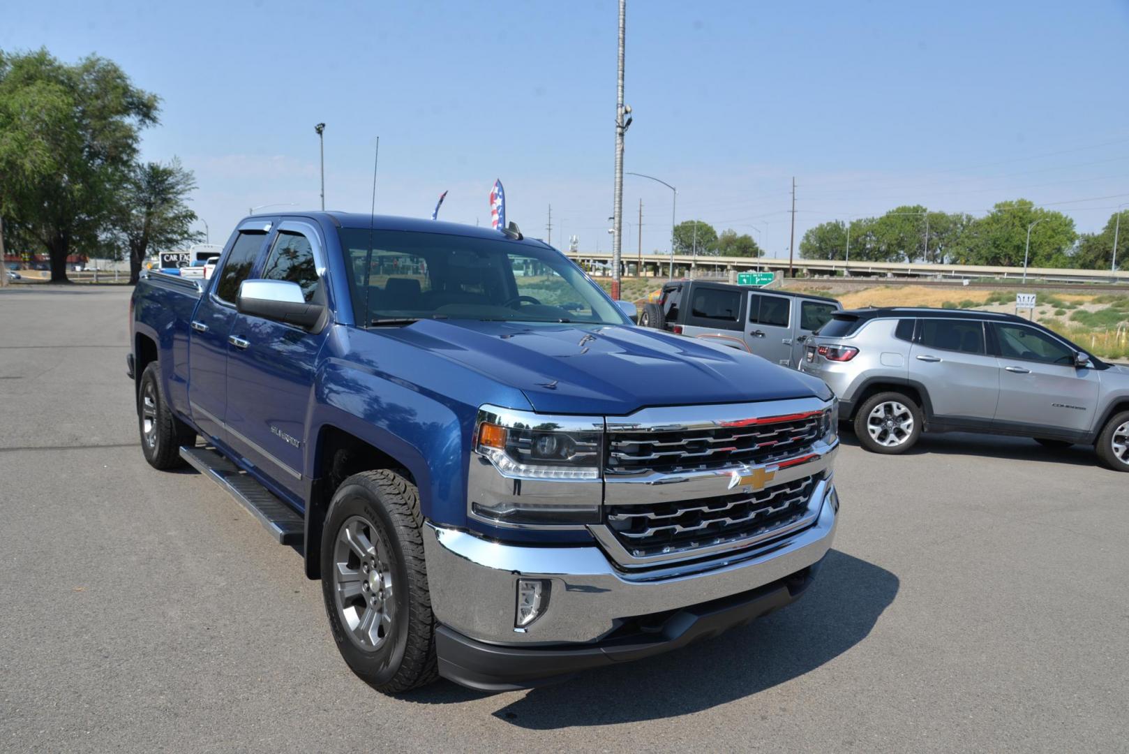 2016 Blue /Black Chevrolet Silverado 1500 LTZ Double Cab Short Box 4WD (1GCVKSEC0GZ) with an 5.3L V8 OHV 16V engine, 6 speed automatic transmission, located at 4562 State Avenue, Billings, MT, 59101, (406) 896-9833, 45.769516, -108.526772 - 2016 Chevy Silverado 1500 double Cab 4x4 LTZ This Chevy is very Clean, The history report shows its a 1 Owner Truck with no accidents reported. This Truck has low miles, It Runs and drives nicely and the tires are in next to new condition. it has a 5.3 Liter V8, 6 Speed automatic transmission, 3. - Photo#3