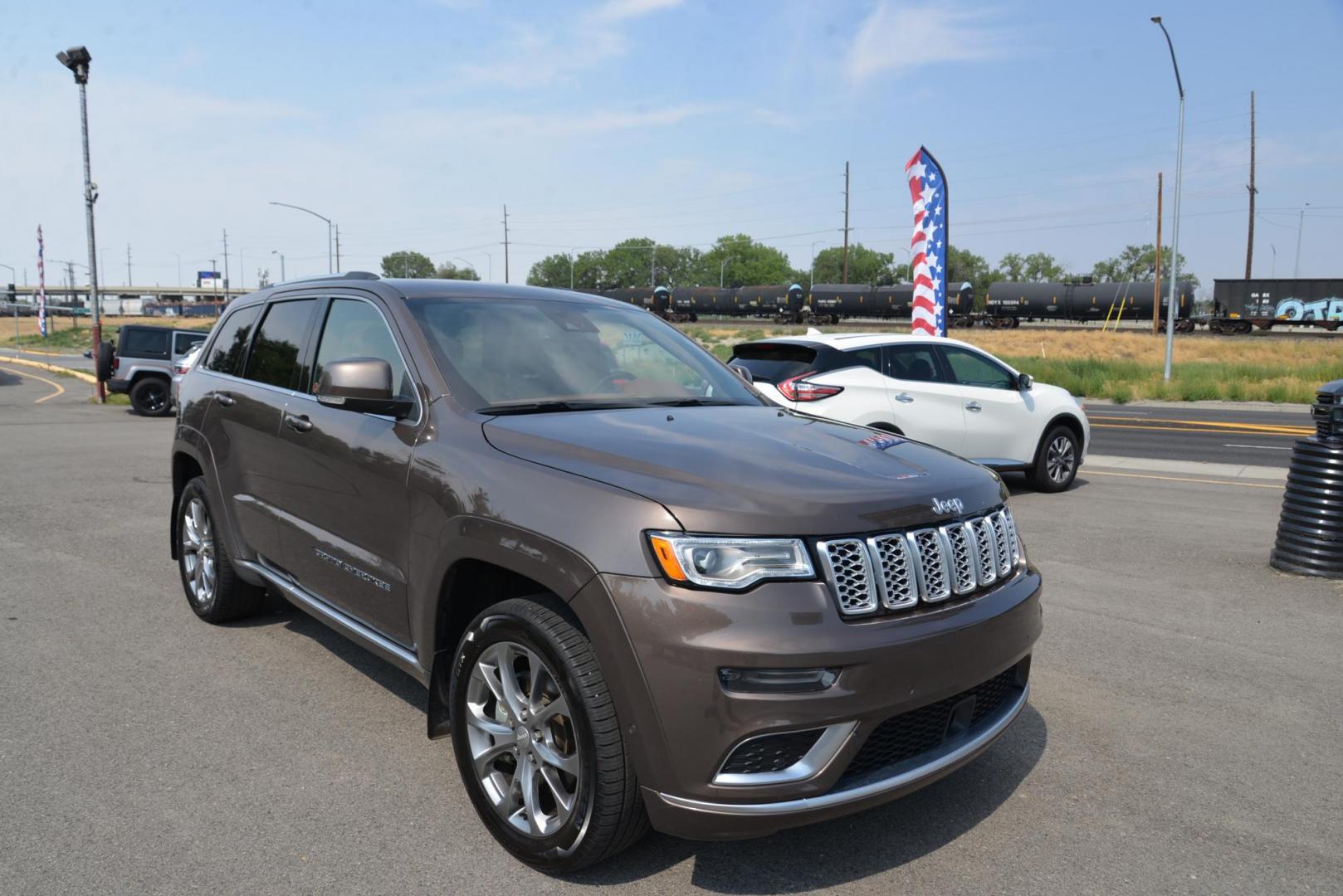 2021 Walnut Brown Metallic /Dark Sienna Brown/Black Jeep Grand Cherokee Summit 4WD (1C4RJFJG5MC) with an 3.6L V6 DOHC 24V engine, 8 speed Automatic transmission, located at 4562 State Avenue, Billings, MT, 59101, (406) 896-9833, 45.769516, -108.526772 - This is a 2021 Jeep Grand Cherokee Summit 4x4 The Summit is a one owner vehicle, there are no accidents reported on the history report. The SUV is very clean, and it drives down the road smooth and quiet. The Tires are in great shape and, if you are looking for a Cherokee with all the equipment th - Photo#2