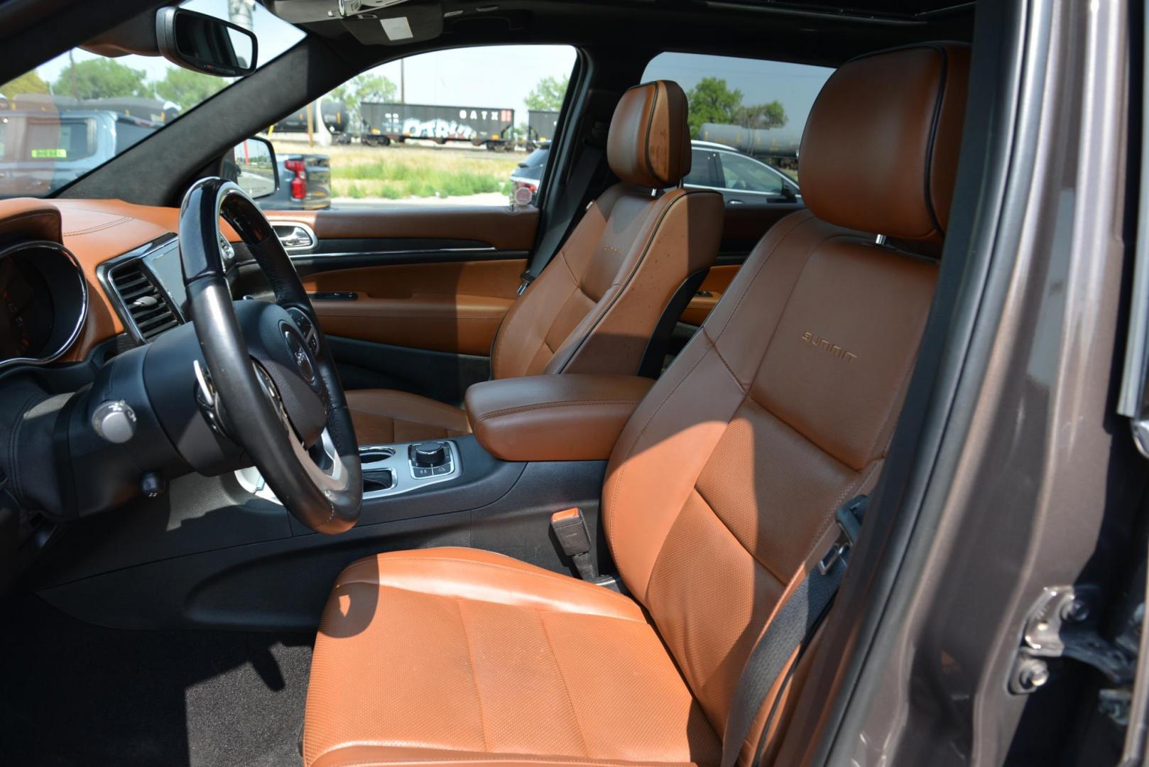 2021 Walnut Brown Metallic /Dark Sienna Brown/Black Jeep Grand Cherokee Summit 4WD (1C4RJFJG5MC) with an 3.6L V6 DOHC 24V engine, 8 speed Automatic transmission, located at 4562 State Avenue, Billings, MT, 59101, (406) 896-9833, 45.769516, -108.526772 - This is a 2021 Jeep Grand Cherokee Summit 4x4 The Summit is a one owner vehicle, there are no accidents reported on the history report. The SUV is very clean, and it drives down the road smooth and quiet. The Tires are in great shape and, if you are looking for a Cherokee with all the equipment th - Photo#12