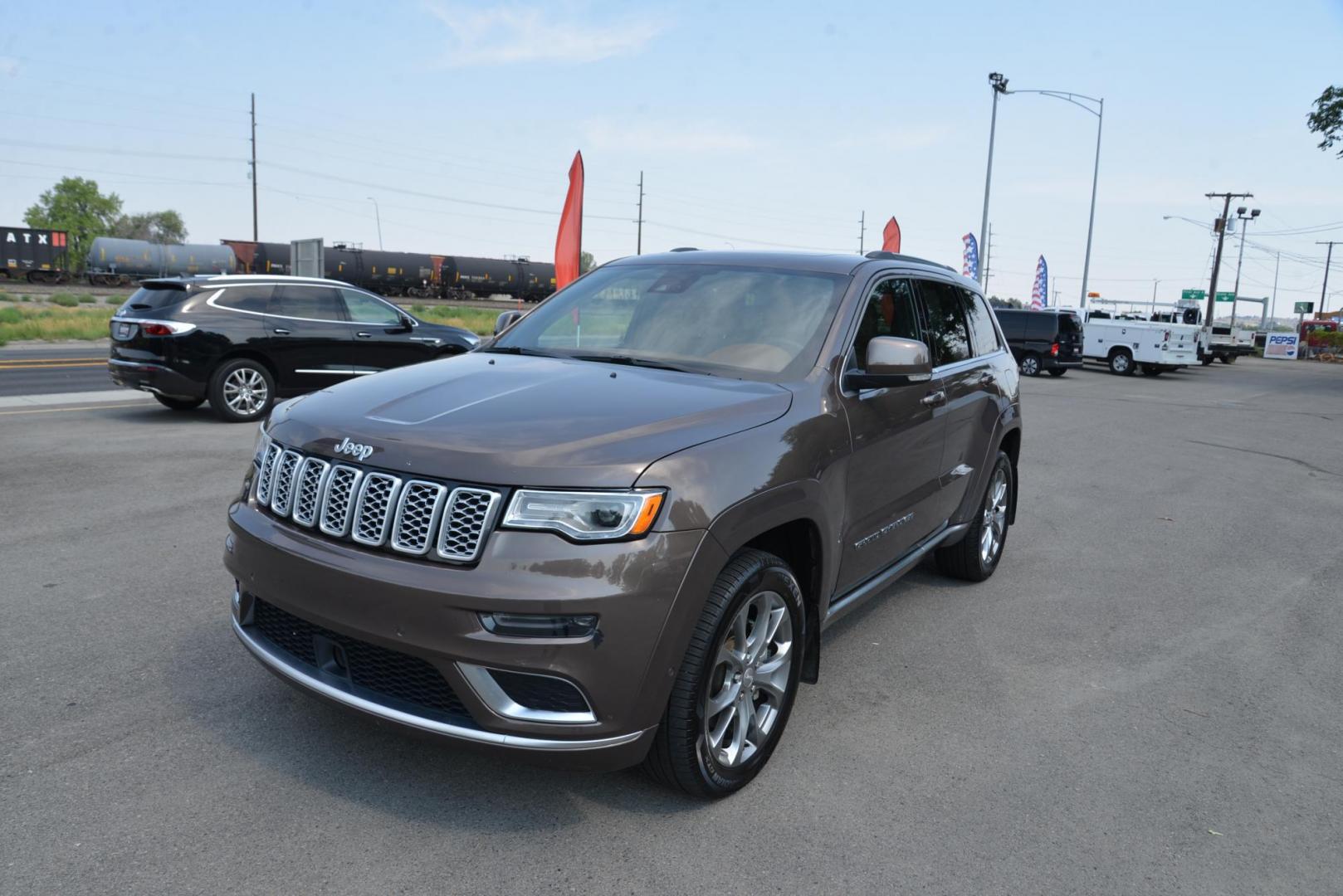 2021 Walnut Brown Metallic /Dark Sienna Brown/Black Jeep Grand Cherokee Summit 4WD (1C4RJFJG5MC) with an 3.6L V6 DOHC 24V engine, 8 speed Automatic transmission, located at 4562 State Avenue, Billings, MT, 59101, (406) 896-9833, 45.769516, -108.526772 - This is a 2021 Jeep Grand Cherokee Summit 4x4 The Summit is a one owner vehicle, there are no accidents reported on the history report. The SUV is very clean, and it drives down the road smooth and quiet. The Tires are in great shape and, if you are looking for a Cherokee with all the equipment th - Photo#5