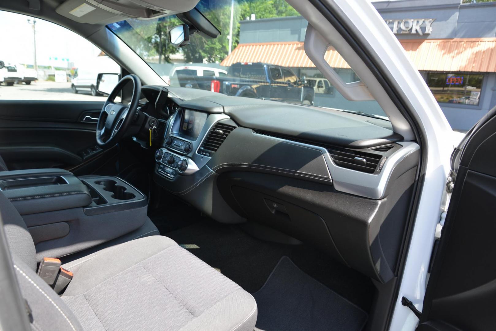 2017 Summit White /Jet Black Chevrolet Tahoe LS 4WD (1GNSKAEC0HR) with an 5.3L V8 OHV 16V engine, 6A transmission, located at 4562 State Avenue, Billings, MT, 59101, (406) 896-9833, 45.769516, -108.526772 - Photo#24