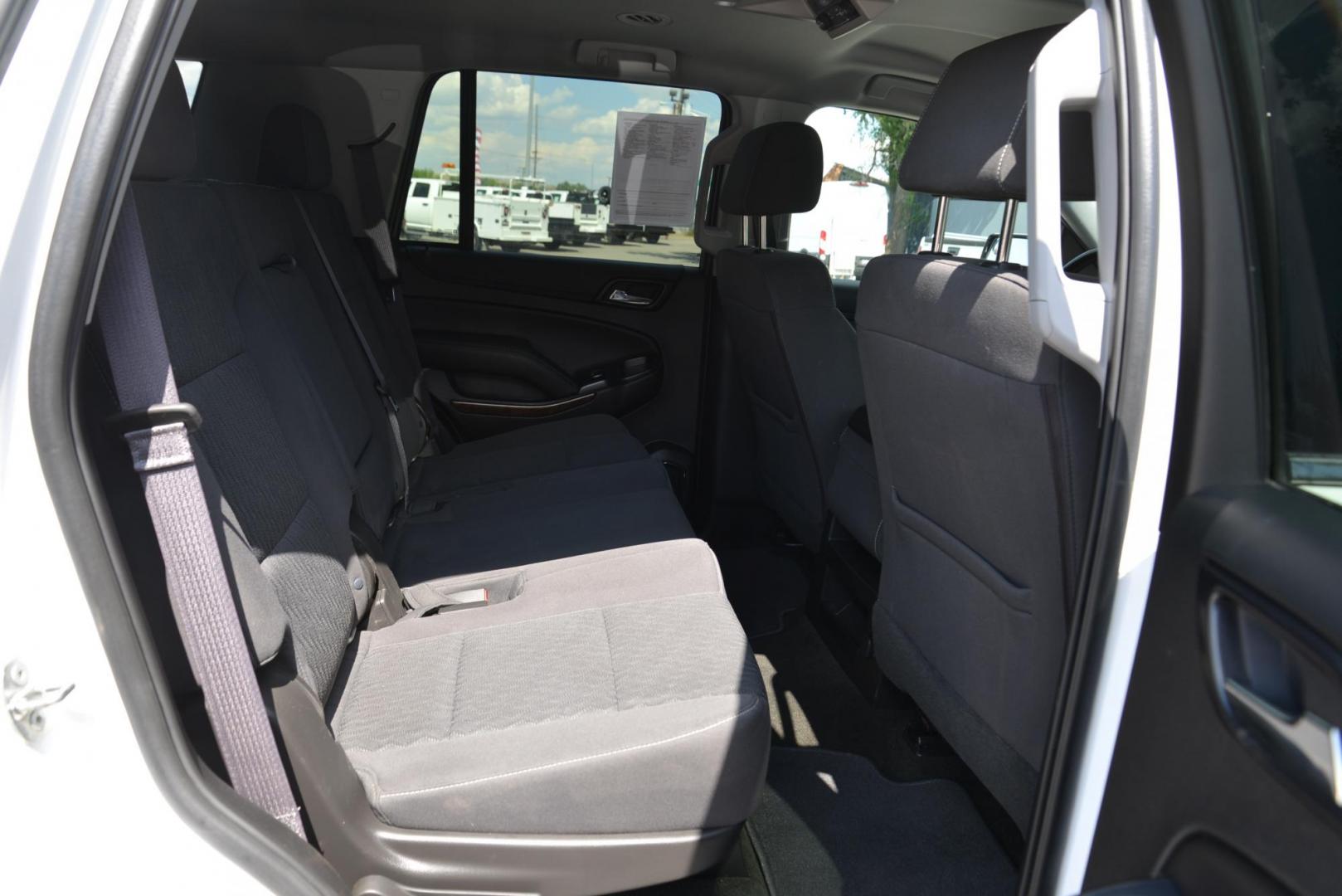 2017 Summit White /Jet Black Chevrolet Tahoe LS 4WD (1GNSKAEC0HR) with an 5.3L V8 OHV 16V engine, 6A transmission, located at 4562 State Avenue, Billings, MT, 59101, (406) 896-9833, 45.769516, -108.526772 - Photo#25