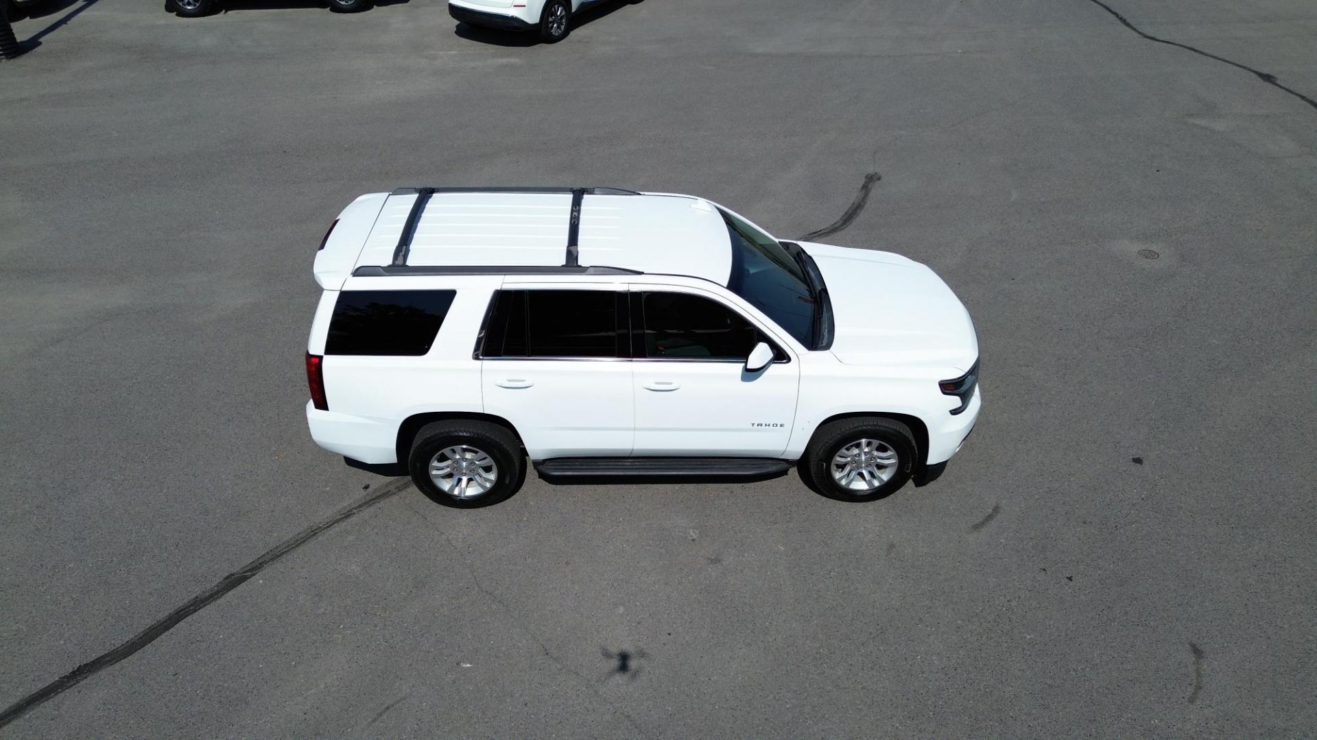 2017 Summit White /Jet Black Chevrolet Tahoe LS 4WD (1GNSKAEC0HR) with an 5.3L V8 OHV 16V engine, 6A transmission, located at 4562 State Avenue, Billings, MT, 59101, (406) 896-9833, 45.769516, -108.526772 - Photo#9