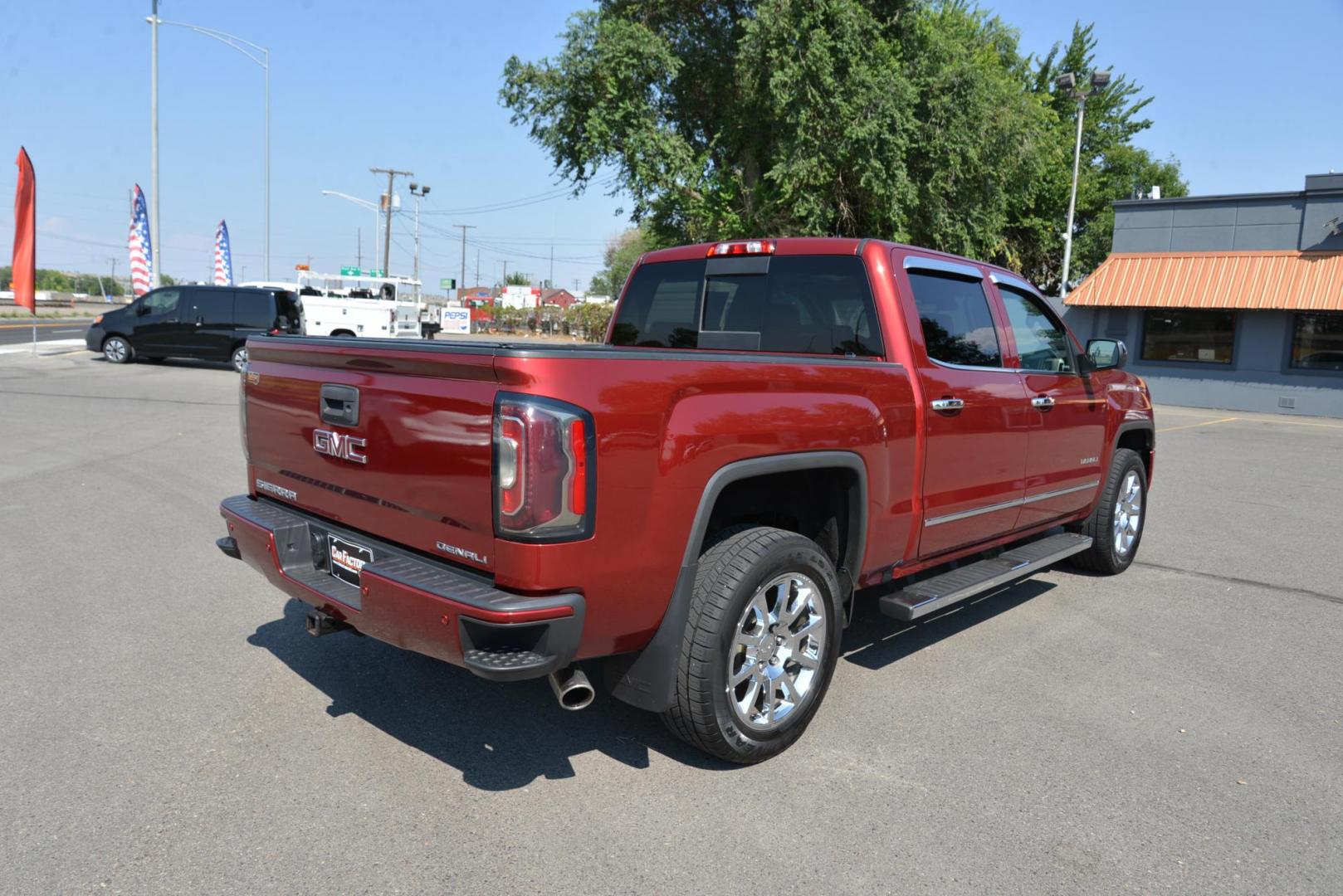 2018 Red Quartz Tintcoat /dark charcoal GMC Sierra 1500 Denali Crew Cab Long Box 4WD (3GTU2PEC3JG) with an 5.3L V8 OHV 16V engine, 8 speed Automatic transmission, located at 4562 State Avenue, Billings, MT, 59101, (406) 896-9833, 45.769516, -108.526772 - Photo#2