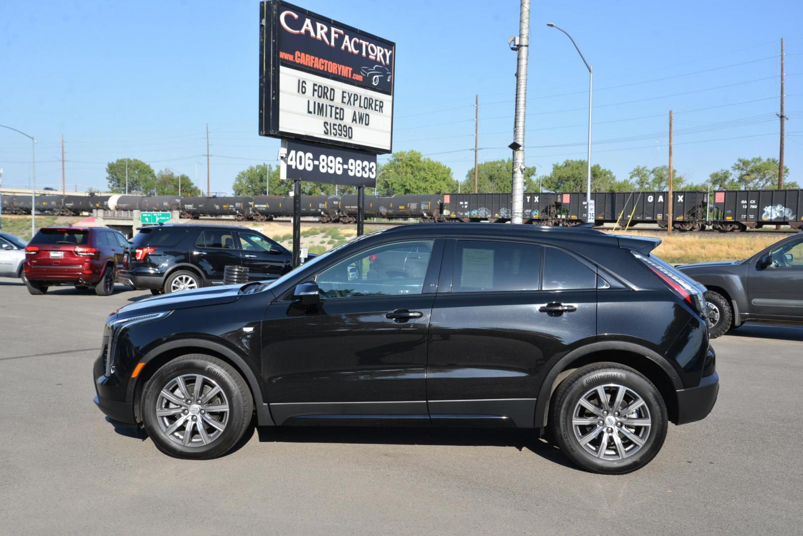 2022 Stellar Black Metallic /Jet Black Cadillac XT4 Sport AWD (1GYFZFR40NF) with an 2.0L L4 DOHC 16V engine, 9A transmission, located at 4562 State Avenue, Billings, MT, 59101, (406) 896-9833, 45.769516, -108.526772 - This Cadillac has remaining factory warranty, only 15,124 miles, and was a local trade-in. It is a two-owner SUV with no accidents reported on the history report. The Cadillac is in excellent condition. The tires are 18-inch Continental ProContact TX, and they are in good condition. Engine: 2.0L - Photo#4