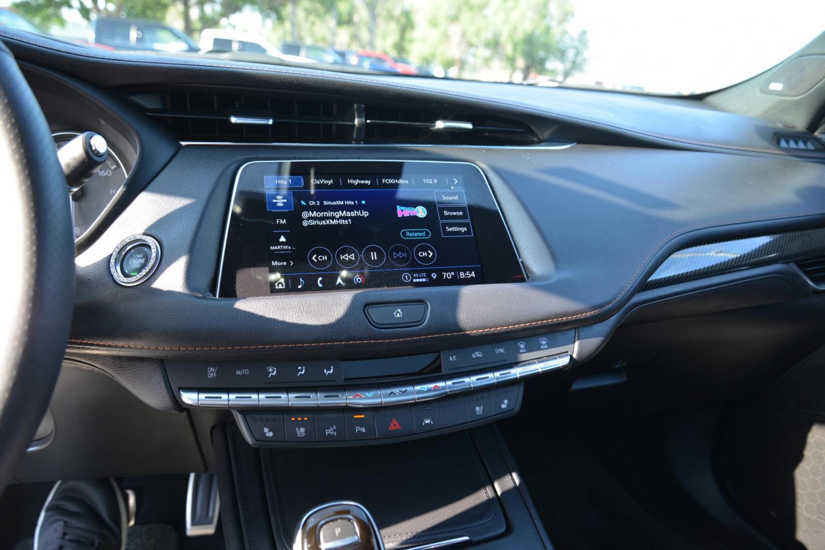 2022 Stellar Black Metallic /Jet Black Cadillac XT4 Sport AWD (1GYFZFR40NF) with an 2.0L L4 DOHC 16V engine, 9A transmission, located at 4562 State Avenue, Billings, MT, 59101, (406) 896-9833, 45.769516, -108.526772 - This Cadillac has remaining factory warranty, only 15,124 miles, and was a local trade-in. It is a two-owner SUV with no accidents reported on the history report. The Cadillac is in excellent condition. The tires are 18-inch Continental ProContact TX, and they are in good condition. Engine: 2.0L - Photo#9