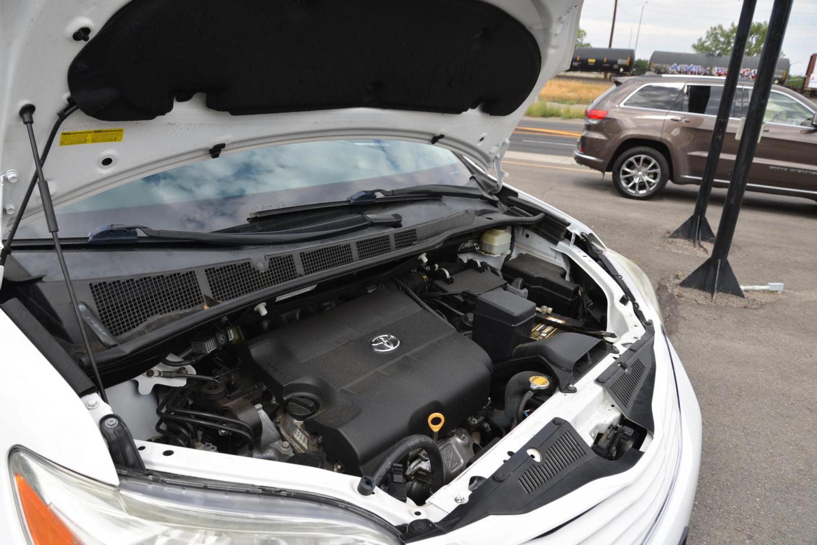 2016 White /Grey Toyota Sienna LE with an 3.5L V6 engine, 6 speed automatic transmission, located at 4562 State Avenue, Billings, MT, 59101, (406) 896-9833, 45.769516, -108.526772 - 2016 Toyota Sienna LE This is a 2 owner vehicle, the Van has no accidents reported to CarFax, there are 18 service history records reported on CarFax, The Toyota has low miles. It has 17 Inch Cooper Discoverer Tires that are in good shape, The Sienna runs and drives nicely. Mileage: 95,384 miles - Photo#11