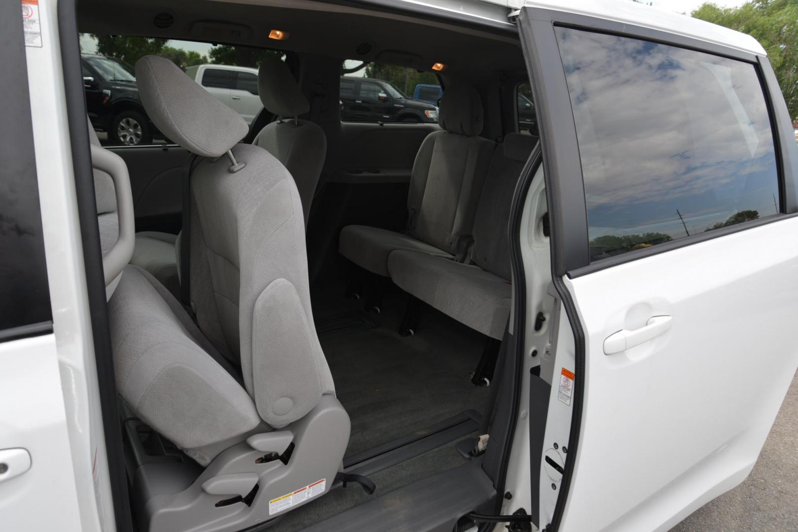 2016 White /Grey Toyota Sienna LE with an 3.5L V6 engine, 6 speed automatic transmission, located at 4562 State Avenue, Billings, MT, 59101, (406) 896-9833, 45.769516, -108.526772 - 2016 Toyota Sienna LE This is a 2 owner vehicle, the Van has no accidents reported to CarFax, there are 18 service history records reported on CarFax, The Toyota has low miles. It has 17 Inch Cooper Discoverer Tires that are in good shape, The Sienna runs and drives nicely. Mileage: 95,384 miles - Photo#19