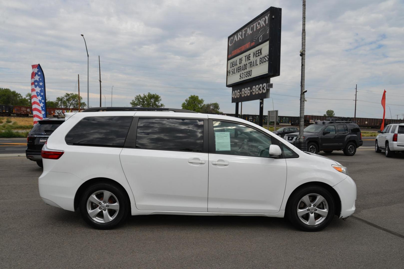 2016 White /Grey Toyota Sienna LE with an 3.5L V6 engine, 6 speed automatic transmission, located at 4562 State Avenue, Billings, MT, 59101, (406) 896-9833, 45.769516, -108.526772 - 2016 Toyota Sienna LE This is a 2 owner vehicle, the Van has no accidents reported to CarFax, there are 18 service history records reported on CarFax, The Toyota has low miles. It has 17 Inch Cooper Discoverer Tires that are in good shape, The Sienna runs and drives nicely. Mileage: 95,384 miles - Photo#4