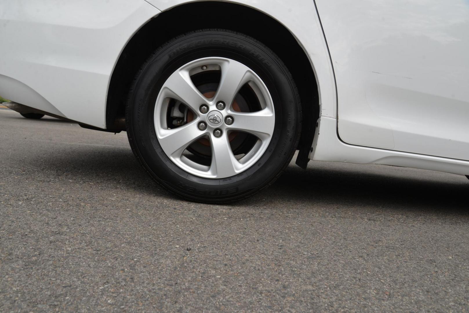 2016 White /Grey Toyota Sienna LE with an 3.5L V6 engine, 6 speed automatic transmission, located at 4562 State Avenue, Billings, MT, 59101, (406) 896-9833, 45.769516, -108.526772 - 2016 Toyota Sienna LE This is a 2 owner vehicle, the Van has no accidents reported to CarFax, there are 18 service history records reported on CarFax, The Toyota has low miles. It has 17 Inch Cooper Discoverer Tires that are in good shape, The Sienna runs and drives nicely. Mileage: 95,384 miles - Photo#8