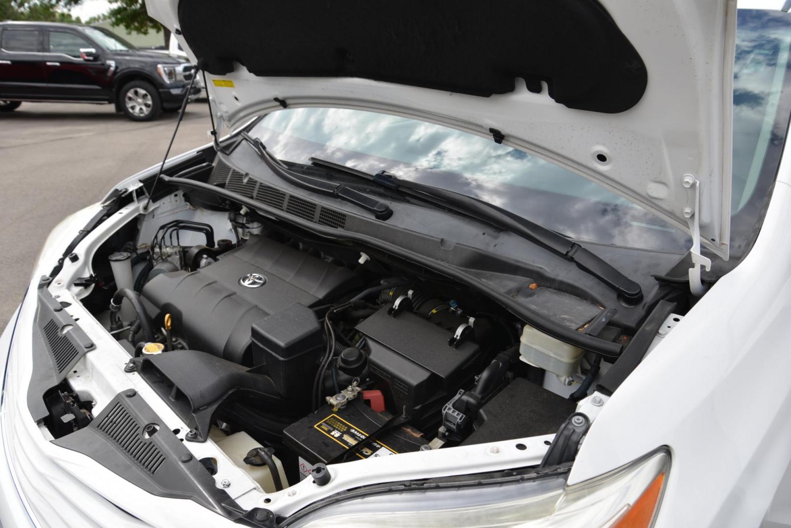 2016 White /Grey Toyota Sienna LE with an 3.5L V6 engine, 6 speed automatic transmission, located at 4562 State Avenue, Billings, MT, 59101, (406) 896-9833, 45.769516, -108.526772 - 2016 Toyota Sienna LE This is a 2 owner vehicle, the Van has no accidents reported to CarFax, there are 18 service history records reported on CarFax, The Toyota has low miles. It has 17 Inch Cooper Discoverer Tires that are in good shape, The Sienna runs and drives nicely. Mileage: 95,384 miles - Photo#9