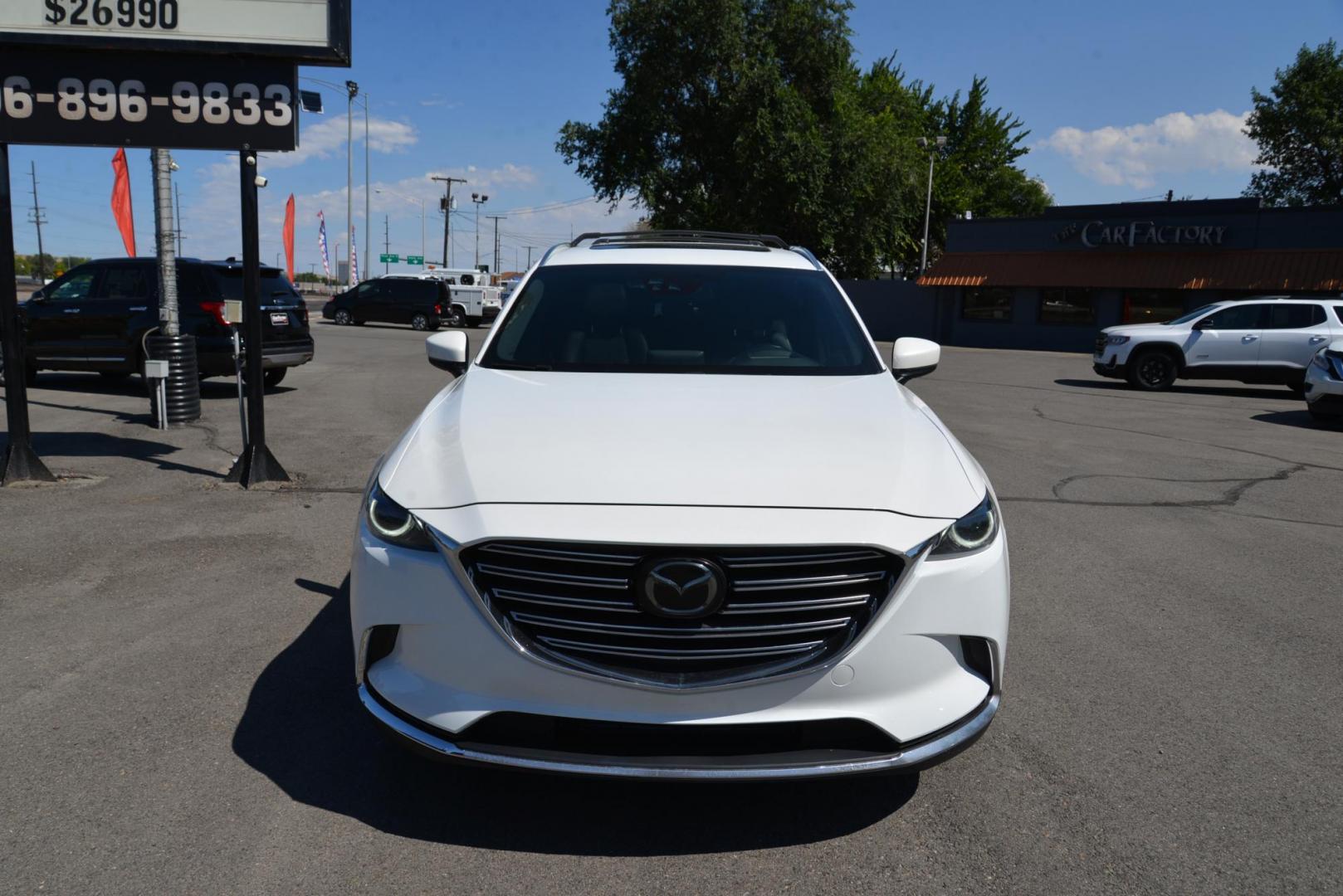 2017 White /Black Mazda CX-9 Grand Touring AWD (JM3TCBDY0H0) with an 2.5L L4 DOHC 16V engine, 6A transmission, located at 4562 State Avenue, Billings, MT, 59101, (406) 896-9833, 45.769516, -108.526772 - 2017 Mazda CX-9 Grand Touring All Wheel Drive This is a 1 owner vehicle and there are no accidents reported on the history report. The CX-9 runs smooth and quiet, the tires are 20 inch Uniroyal Tiger Paws and they are in great condition. This Cross Over is very clean it has a 2.5 liter Turbo 4 cyl - Photo#4