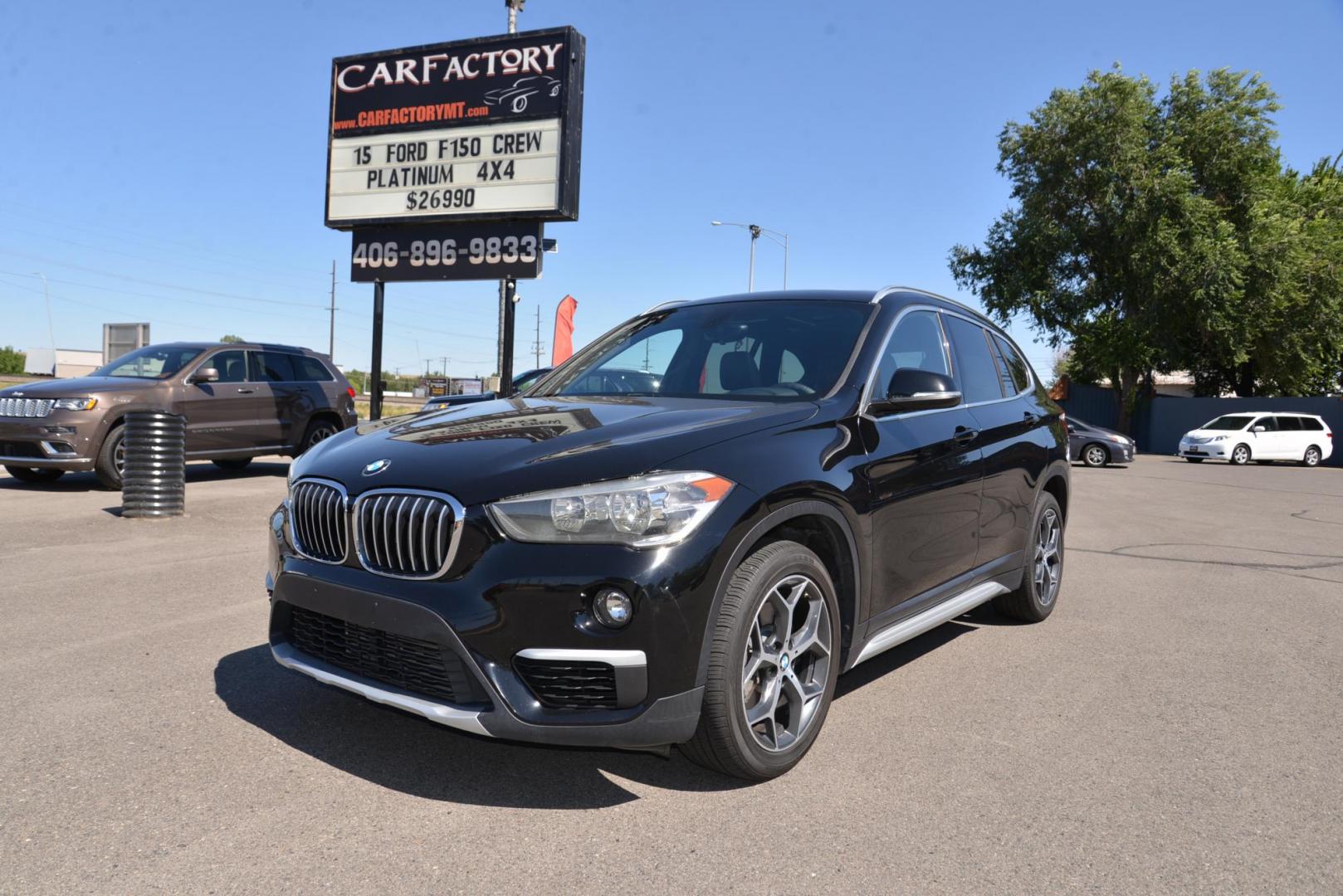 2018 black /Black BMW X1 sDrive28i (WBXHU7C33J5) with an 2.0L L4 DOHC 16V engine, 8A transmission, located at 4562 State Avenue, Billings, MT, 59101, (406) 896-9833, 45.769516, -108.526772 - This is a 2018 BMW X1 sDrive28i The X1 is a Low Mileage two owner vehicle, there are multiple service records reported and there are no accidents reported on the history report, The BMW has very low miles and runs and drives smooth and quiet. The tires are in great shape, this cross over is very cl - Photo#1