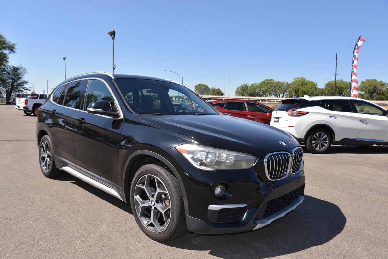 2018 black /Black BMW X1 sDrive28i (WBXHU7C33J5) with an 2.0L L4 DOHC 16V engine, 8A transmission, located at 4562 State Avenue, Billings, MT, 59101, (406) 896-9833, 45.769516, -108.526772 - This is a 2018 BMW X1 sDrive28i The X1 is a Low Mileage two owner vehicle, there are multiple service records reported and there are no accidents reported on the history report, The BMW has very low miles and runs and drives smooth and quiet. The tires are in great shape, this cross over is very cl - Photo#5