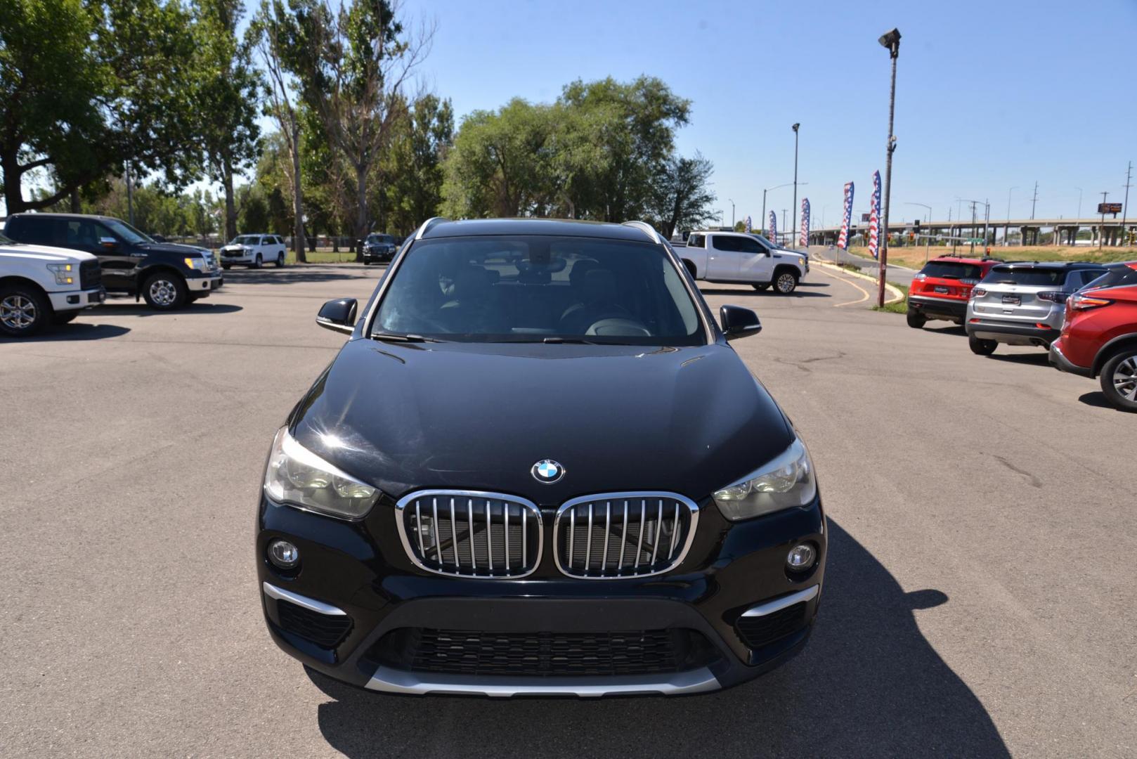 2018 black /Black BMW X1 sDrive28i (WBXHU7C33J5) with an 2.0L L4 DOHC 16V engine, 8A transmission, located at 4562 State Avenue, Billings, MT, 59101, (406) 896-9833, 45.769516, -108.526772 - This is a 2018 BMW X1 sDrive28i The X1 is a Low Mileage two owner vehicle, there are multiple service records reported and there are no accidents reported on the history report, The BMW has very low miles and runs and drives smooth and quiet. The tires are in great shape, this cross over is very cl - Photo#4