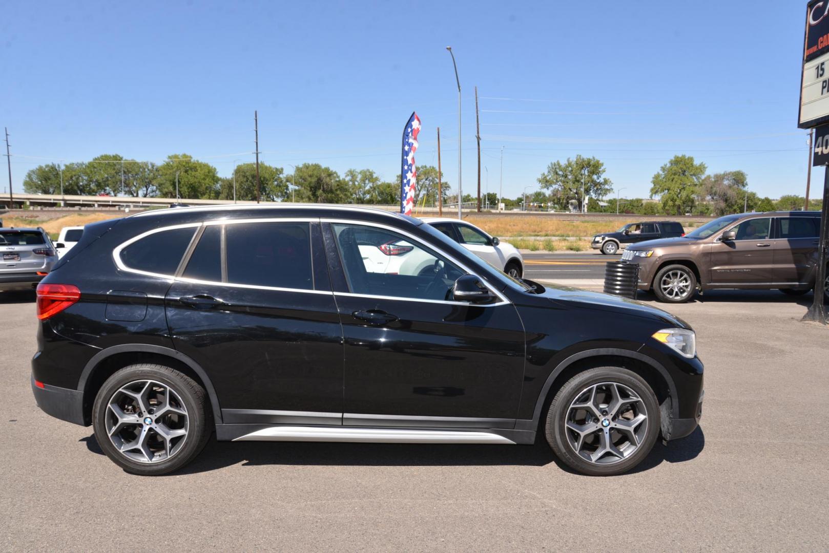 2018 black /Black BMW X1 sDrive28i (WBXHU7C33J5) with an 2.0L L4 DOHC 16V engine, 8A transmission, located at 4562 State Avenue, Billings, MT, 59101, (406) 896-9833, 45.769516, -108.526772 - This is a 2018 BMW X1 sDrive28i The X1 is a Low Mileage two owner vehicle, there are multiple service records reported and there are no accidents reported on the history report, The BMW has very low miles and runs and drives smooth and quiet. The tires are in great shape, this cross over is very cl - Photo#6