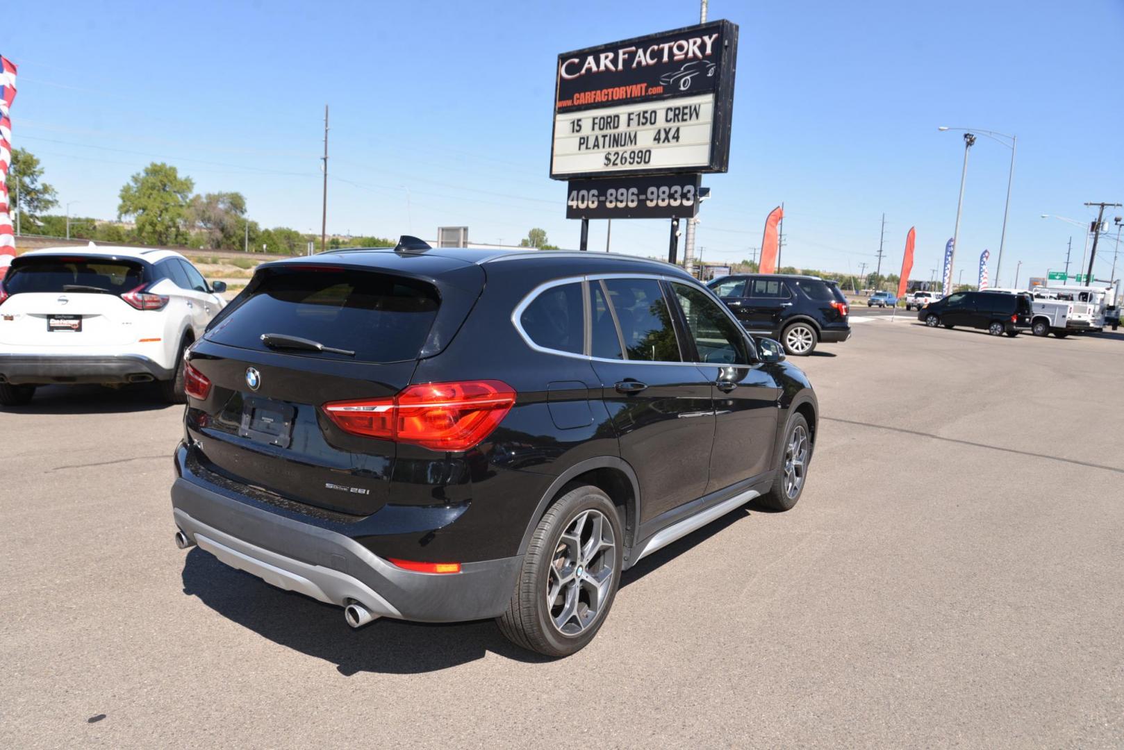 2018 black /Black BMW X1 sDrive28i (WBXHU7C33J5) with an 2.0L L4 DOHC 16V engine, 8A transmission, located at 4562 State Avenue, Billings, MT, 59101, (406) 896-9833, 45.769516, -108.526772 - This is a 2018 BMW X1 sDrive28i The X1 is a Low Mileage two owner vehicle, there are multiple service records reported and there are no accidents reported on the history report, The BMW has very low miles and runs and drives smooth and quiet. The tires are in great shape, this cross over is very cl - Photo#7