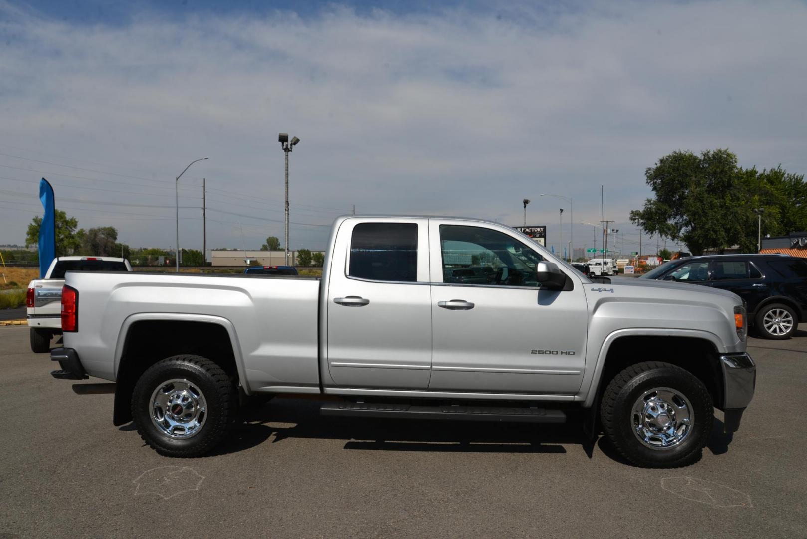 2015 Quicksilver Metallic /Dark Ash GMC Sierra 2500HD SLE Double Cab 4WD (1GT22YEG7FZ) with an 6.0L V8 OHV 16V FFV engine, 6-Speed Heavy Duty Automatic transmission, located at 4562 State Avenue, Billings, MT, 59101, (406) 896-9833, 45.769516, -108.526772 - 2015 GMC Sierra SLE Double Cab 4x4 This Low Mileage GMC is a One Owner truck with no accidents reported on the history report. the Interior and Exterior are in very clean shape given its year. The Sierra runs and drives nicely. The Tires are 17 Inch Nitto Grappler's and they are in great condition - Photo#9