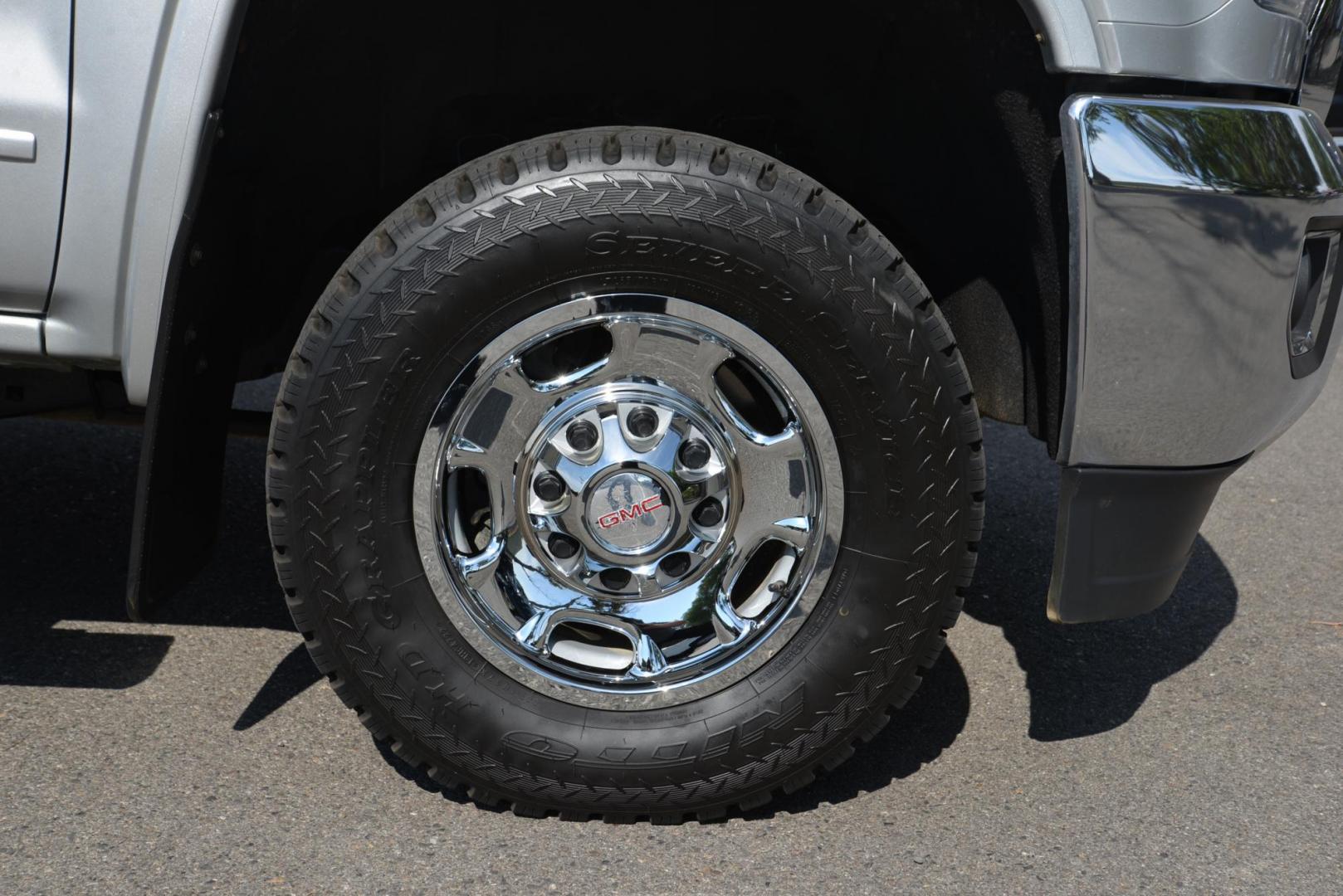 2015 Quicksilver Metallic /Dark Ash GMC Sierra 2500HD SLE Double Cab 4WD (1GT22YEG7FZ) with an 6.0L V8 OHV 16V FFV engine, 6-Speed Heavy Duty Automatic transmission, located at 4562 State Avenue, Billings, MT, 59101, (406) 896-9833, 45.769516, -108.526772 - 2015 GMC Sierra SLE Double Cab 4x4 This Low Mileage GMC is a One Owner truck with no accidents reported on the history report. the Interior and Exterior are in very clean shape given its year. The Sierra runs and drives nicely. The Tires are 17 Inch Nitto Grappler's and they are in great condition - Photo#13