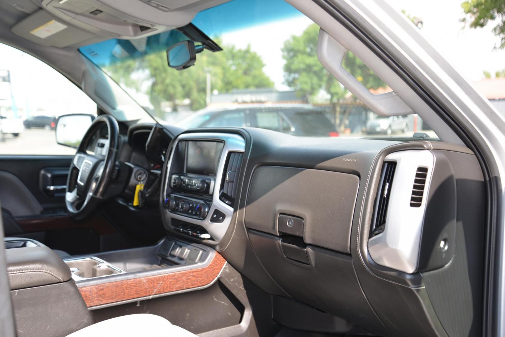 2015 Quicksilver Metallic /Dark Ash GMC Sierra 2500HD SLE Double Cab 4WD (1GT22YEG7FZ) with an 6.0L V8 OHV 16V FFV engine, 6-Speed Heavy Duty Automatic transmission, located at 4562 State Avenue, Billings, MT, 59101, (406) 896-9833, 45.769516, -108.526772 - 2015 GMC Sierra SLE Double Cab 4x4 This Low Mileage GMC is a One Owner truck with no accidents reported on the history report. the Interior and Exterior are in very clean shape given its year. The Sierra runs and drives nicely. The Tires are 17 Inch Nitto Grappler's and they are in great condition - Photo#26