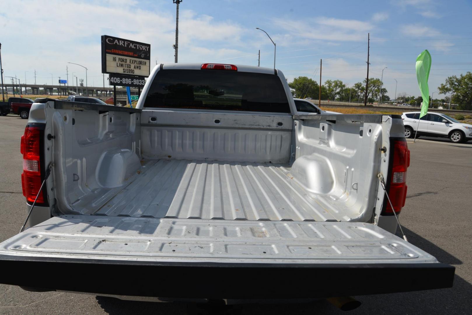 2015 Quicksilver Metallic /Dark Ash GMC Sierra 2500HD SLE Double Cab 4WD (1GT22YEG7FZ) with an 6.0L V8 OHV 16V FFV engine, 6-Speed Heavy Duty Automatic transmission, located at 4562 State Avenue, Billings, MT, 59101, (406) 896-9833, 45.769516, -108.526772 - 2015 GMC Sierra SLE Double Cab 4x4 This Low Mileage GMC is a One Owner truck with no accidents reported on the history report. the Interior and Exterior are in very clean shape given its year. The Sierra runs and drives nicely. The Tires are 17 Inch Nitto Grappler's and they are in great condition - Photo#6