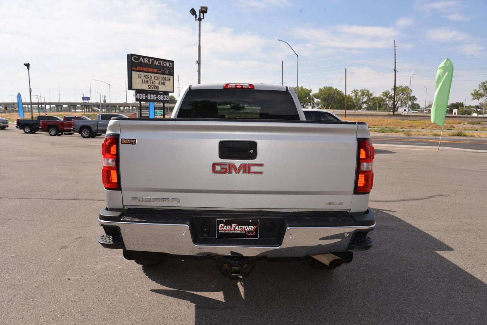 2015 Quicksilver Metallic /Dark Ash GMC Sierra 2500HD SLE Double Cab 4WD (1GT22YEG7FZ) with an 6.0L V8 OHV 16V FFV engine, 6-Speed Heavy Duty Automatic transmission, located at 4562 State Avenue, Billings, MT, 59101, (406) 896-9833, 45.769516, -108.526772 - 2015 GMC Sierra SLE Double Cab 4x4 This Low Mileage GMC is a One Owner truck with no accidents reported on the history report. the Interior and Exterior are in very clean shape given its year. The Sierra runs and drives nicely. The Tires are 17 Inch Nitto Grappler's and they are in great condition - Photo#5