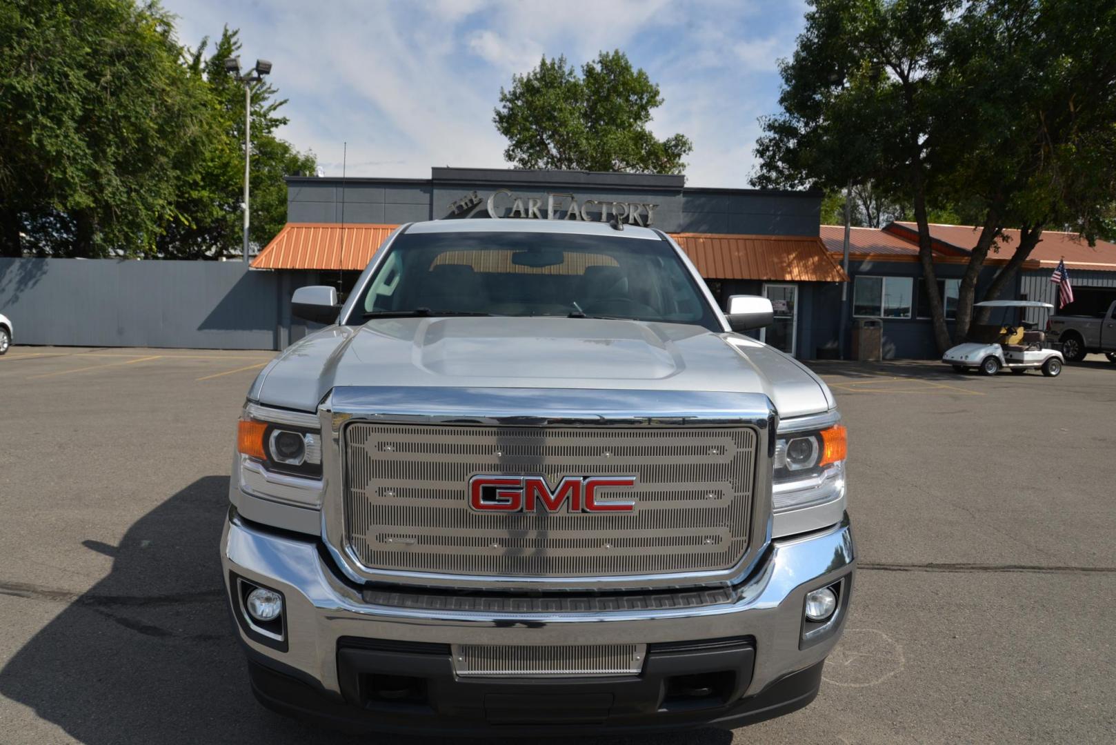 2015 Quicksilver Metallic /Dark Ash GMC Sierra 2500HD SLE Double Cab 4WD (1GT22YEG7FZ) with an 6.0L V8 OHV 16V FFV engine, 6-Speed Heavy Duty Automatic transmission, located at 4562 State Avenue, Billings, MT, 59101, (406) 896-9833, 45.769516, -108.526772 - 2015 GMC Sierra SLE Double Cab 4x4 This Low Mileage GMC is a One Owner truck with no accidents reported on the history report. the Interior and Exterior are in very clean shape given its year. The Sierra runs and drives nicely. The Tires are 17 Inch Nitto Grappler's and they are in great condition - Photo#7