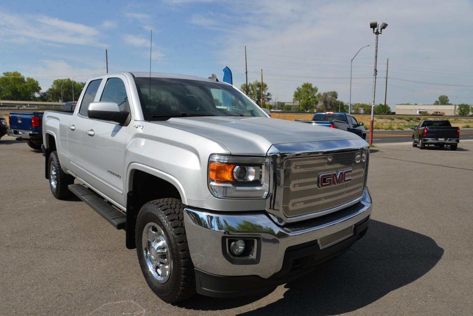 2015 Quicksilver Metallic /Dark Ash GMC Sierra 2500HD SLE Double Cab 4WD (1GT22YEG7FZ) with an 6.0L V8 OHV 16V FFV engine, 6-Speed Heavy Duty Automatic transmission, located at 4562 State Avenue, Billings, MT, 59101, (406) 896-9833, 45.769516, -108.526772 - 2015 GMC Sierra SLE Double Cab 4x4 This Low Mileage GMC is a One Owner truck with no accidents reported on the history report. the Interior and Exterior are in very clean shape given its year. The Sierra runs and drives nicely. The Tires are 17 Inch Nitto Grappler's and they are in great condition - Photo#8