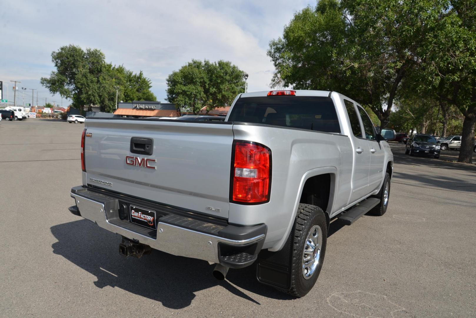 2015 Quicksilver Metallic /Dark Ash GMC Sierra 2500HD SLE Double Cab 4WD (1GT22YEG7FZ) with an 6.0L V8 OHV 16V FFV engine, 6-Speed Heavy Duty Automatic transmission, located at 4562 State Avenue, Billings, MT, 59101, (406) 896-9833, 45.769516, -108.526772 - 2015 GMC Sierra SLE Double Cab 4x4 This Low Mileage GMC is a One Owner truck with no accidents reported on the history report. the Interior and Exterior are in very clean shape given its year. The Sierra runs and drives nicely. The Tires are 17 Inch Nitto Grappler's and they are in great condition - Photo#10