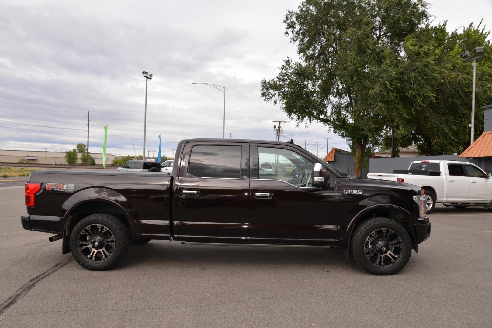 2019 Magma /BLACK /DARK MARSALA Ford F-150 (1FTFW1E50KF) with an 5.0L V8 OHV 16V engine, 6A transmission, located at 4562 State Avenue, Billings, MT, 59101, (406) 896-9833, 45.769516, -108.526772 - 2019 Ford F-150 Platinum SuperCrew with a 6 And A Half Foot Bed, 4 Wheel Drive This is a 1 Owner Low Mileage Truck with no accidents reported on the history report ,the truck runs and drives great , the tires are 20 Inch Cooper Discoverers that are in good shape, and brand new Aftermarket Wheels . - Photo#3