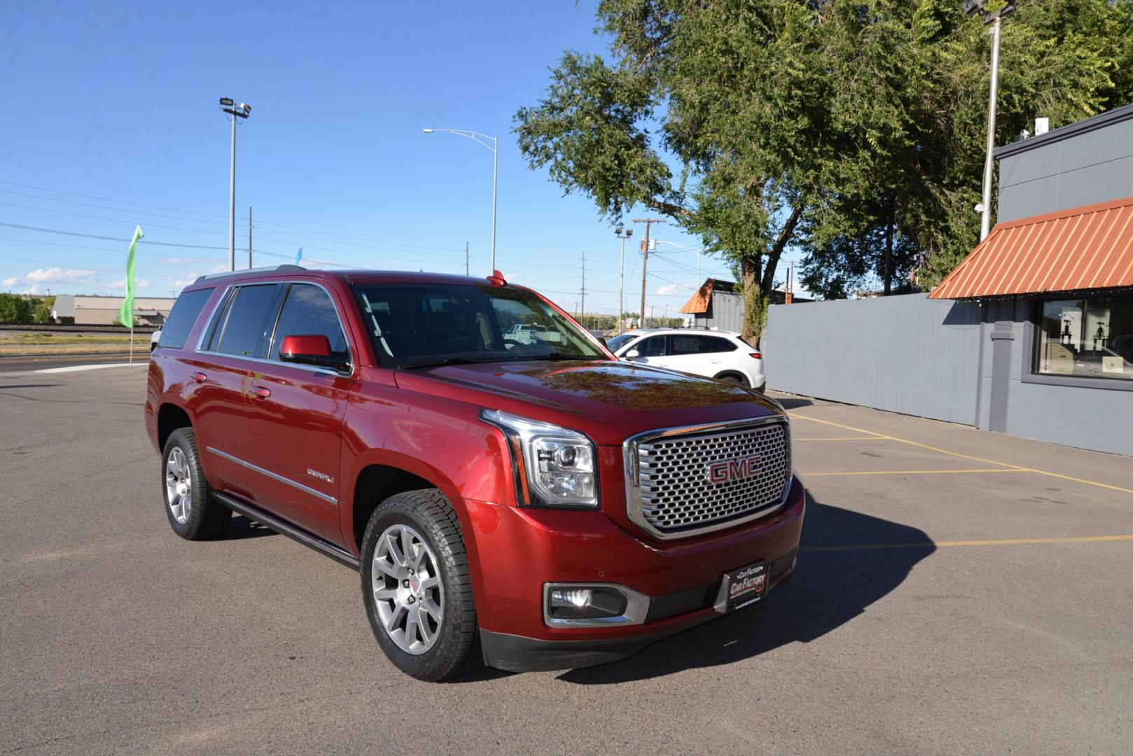 2017 Crimson Red Tintcoat /Cocoa/Dark Atmosphere GMC Yukon Denali Denali (1GKS2CKJ6HR) with an 6.2L V8 OHV 16V engine, 8 speed Automatic transmission, located at 4562 State Avenue, Billings, MT, 59101, (406) 896-9833, 45.769516, -108.526772 - 2017 GMC Yukon Denali 4x4 with 3rd row seating The Yukon is a low mileage Trade In , there are no accidents recorded on the vehicle history report, It operates and handles smoothly. The Interior and Exterior are both very clean. The Tires are 20 inch Falkin Wild Peak's and they are in great shape - Photo#2