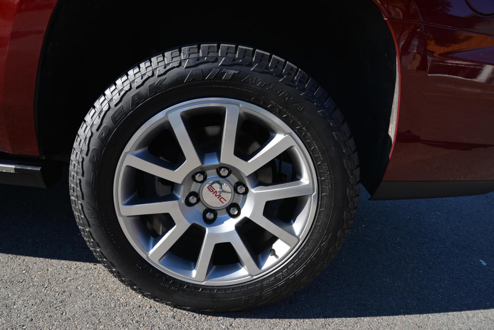 2017 Crimson Red Tintcoat /Cocoa/Dark Atmosphere GMC Yukon Denali Denali (1GKS2CKJ6HR) with an 6.2L V8 OHV 16V engine, 8 speed Automatic transmission, located at 4562 State Avenue, Billings, MT, 59101, (406) 896-9833, 45.769516, -108.526772 - 2017 GMC Yukon Denali 4x4 with 3rd row seating The Yukon is a low mileage Trade In , there are no accidents recorded on the vehicle history report, It operates and handles smoothly. The Interior and Exterior are both very clean. The Tires are 20 inch Falkin Wild Peak's and they are in great shape - Photo#11