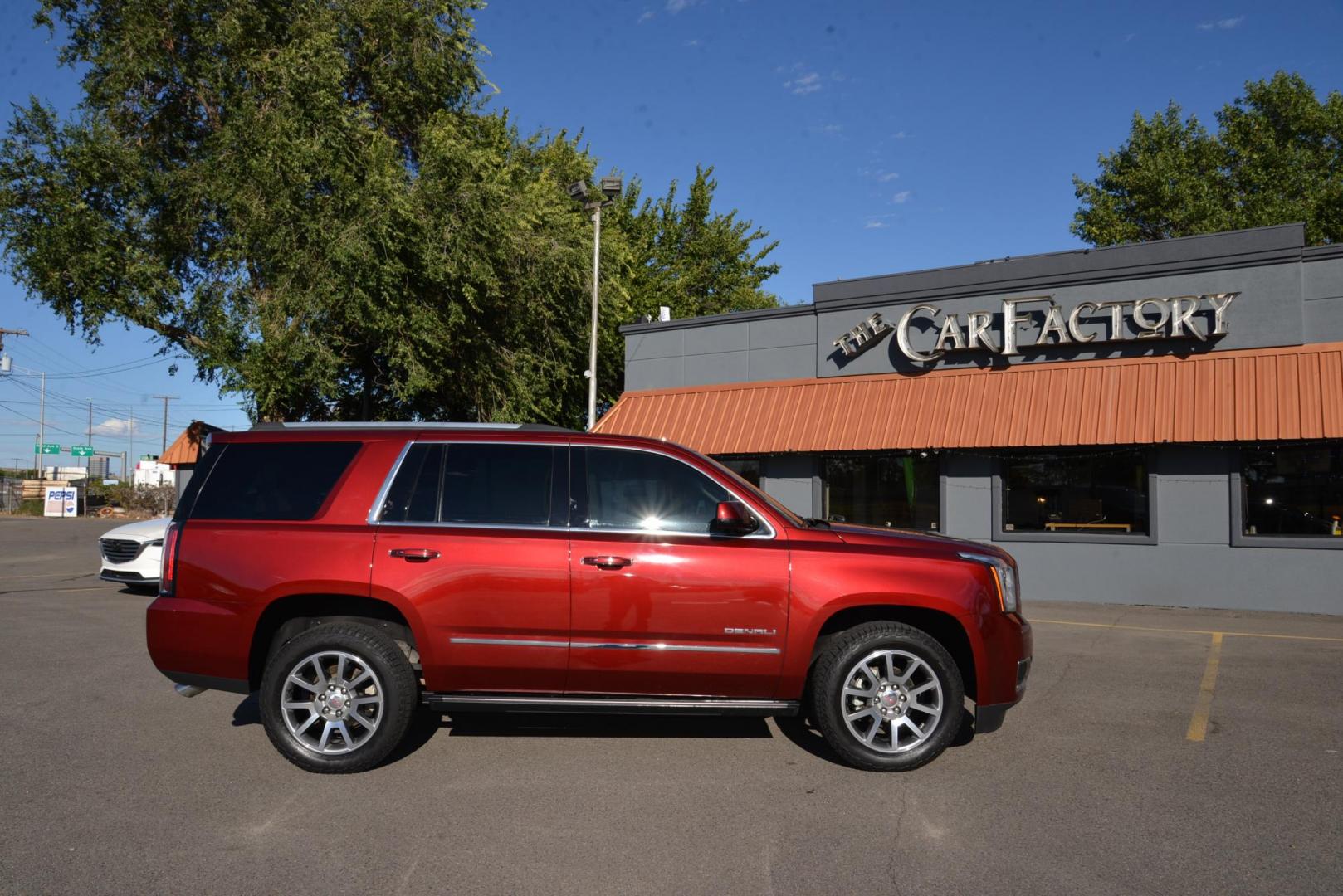 2017 Crimson Red Tintcoat /Cocoa/Dark Atmosphere GMC Yukon Denali Denali (1GKS2CKJ6HR) with an 6.2L V8 OHV 16V engine, 8 speed Automatic transmission, located at 4562 State Avenue, Billings, MT, 59101, (406) 896-9833, 45.769516, -108.526772 - 2017 GMC Yukon Denali 4x4 with 3rd row seating The Yukon is a low mileage Trade In , there are no accidents recorded on the vehicle history report, It operates and handles smoothly. The Interior and Exterior are both very clean. The Tires are 20 inch Falkin Wild Peak's and they are in great shape - Photo#3