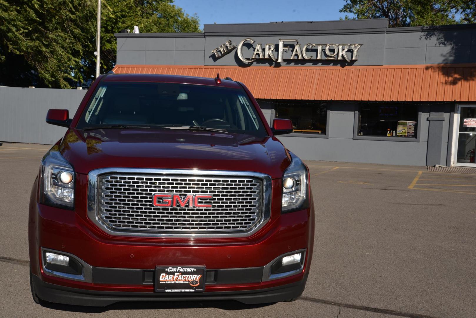 2017 Crimson Red Tintcoat /Cocoa/Dark Atmosphere GMC Yukon Denali Denali (1GKS2CKJ6HR) with an 6.2L V8 OHV 16V engine, 8 speed Automatic transmission, located at 4562 State Avenue, Billings, MT, 59101, (406) 896-9833, 45.769516, -108.526772 - Photo#40