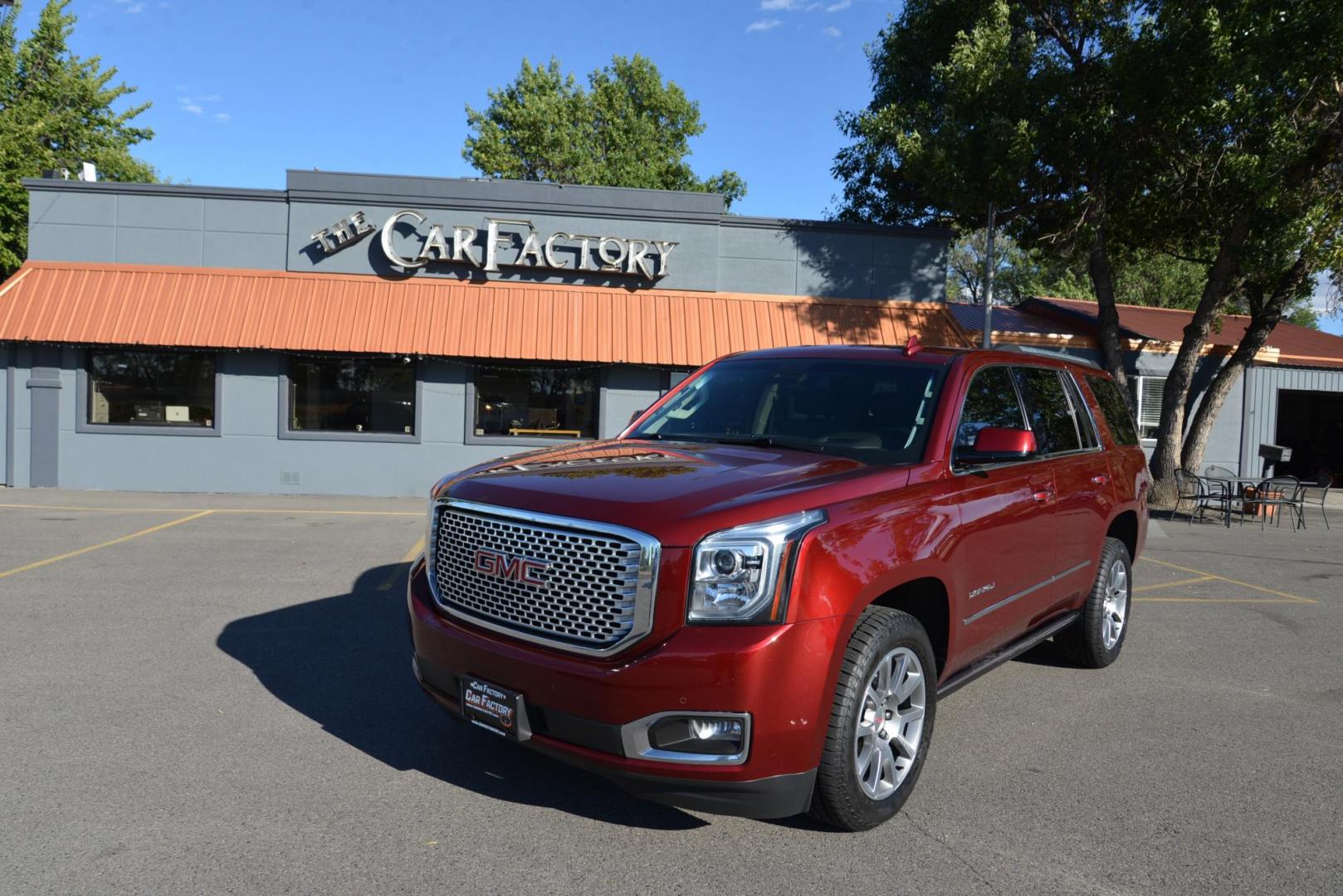 2017 Crimson Red Tintcoat /Cocoa/Dark Atmosphere GMC Yukon Denali Denali (1GKS2CKJ6HR) with an 6.2L V8 OHV 16V engine, 8 speed Automatic transmission, located at 4562 State Avenue, Billings, MT, 59101, (406) 896-9833, 45.769516, -108.526772 - Photo#6