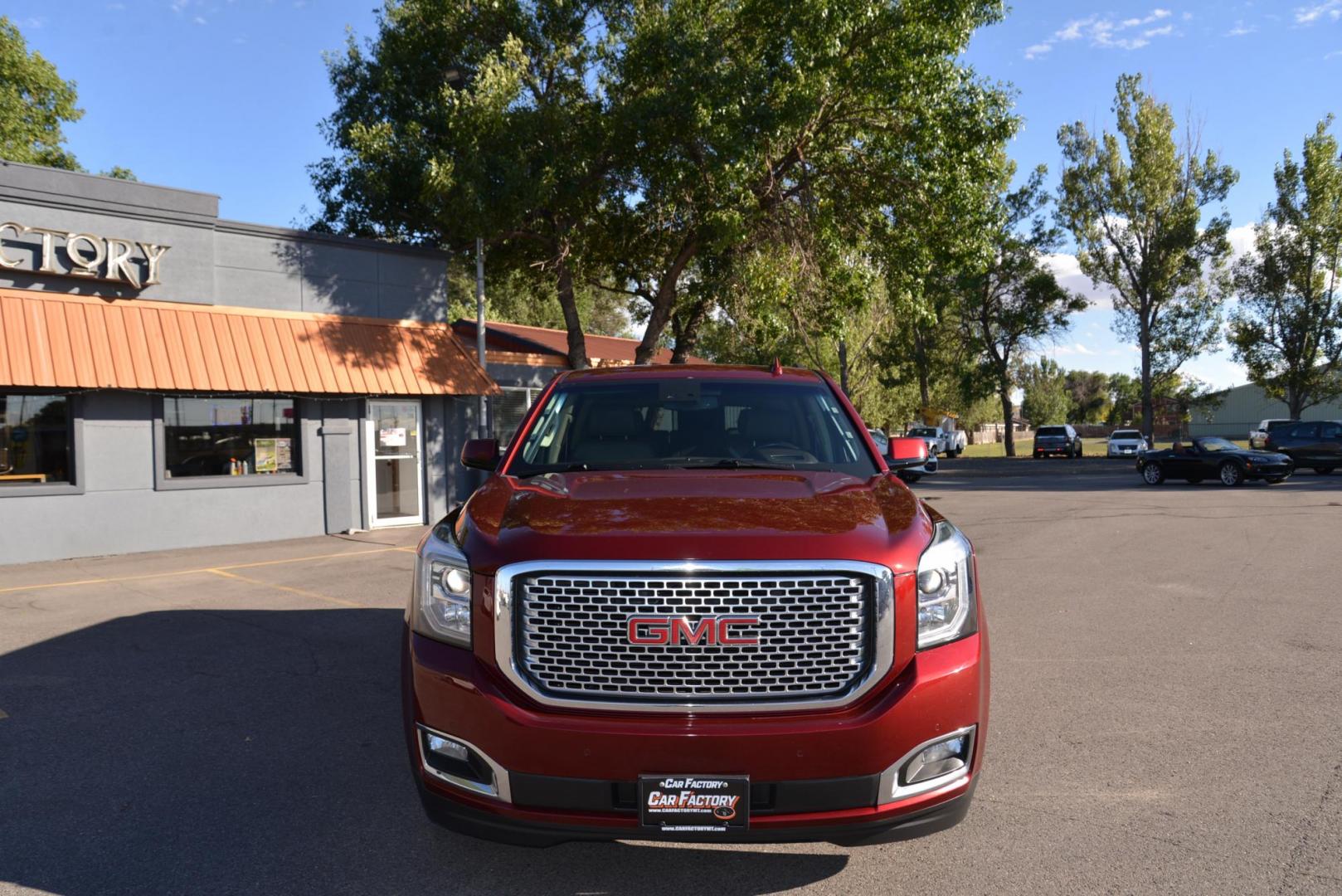 2017 Crimson Red Tintcoat /Cocoa/Dark Atmosphere GMC Yukon Denali Denali (1GKS2CKJ6HR) with an 6.2L V8 OHV 16V engine, 8 speed Automatic transmission, located at 4562 State Avenue, Billings, MT, 59101, (406) 896-9833, 45.769516, -108.526772 - Photo#9