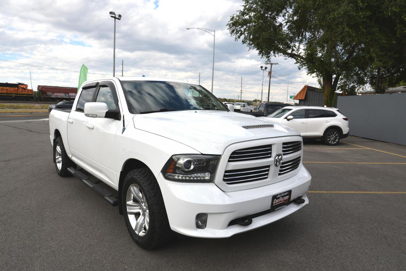 2013 Bright White /Black RAM 1500 Sport (1C6RR7MT6DS) with an 5.7L V8 OHV 16V engine, 6-Speed Automatic transmission, located at 4562 State Avenue, Billings, MT, 59101, (406) 896-9833, 45.769516, -108.526772 - 2013 Dodge 1500 Crew Cab 4x4 Sport This Crew Cab is a local trade in, The interior and exterior are very clean. It runs and drives nicely, The tires are 20 Inch General Grabber's and they are in next to new condition. There are No accidents recorded on the history report. it has a 5.7 Liter Hemi V - Photo#2