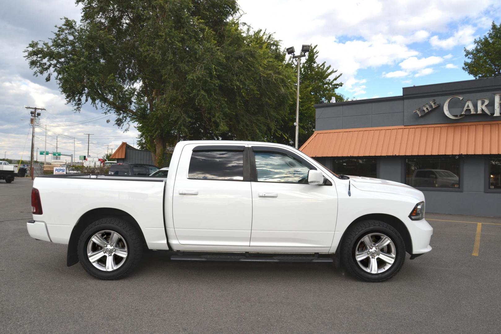 2013 Bright White /Black RAM 1500 Sport (1C6RR7MT6DS) with an 5.7L V8 OHV 16V engine, 6-Speed Automatic transmission, located at 4562 State Avenue, Billings, MT, 59101, (406) 896-9833, 45.769516, -108.526772 - 2013 Dodge 1500 Crew Cab 4x4 Sport This Crew Cab is a local trade in, The interior and exterior are very clean. It runs and drives nicely, The tires are 20 Inch General Grabber's and they are in next to new condition. There are No accidents recorded on the history report. it has a 5.7 Liter Hemi V - Photo#4