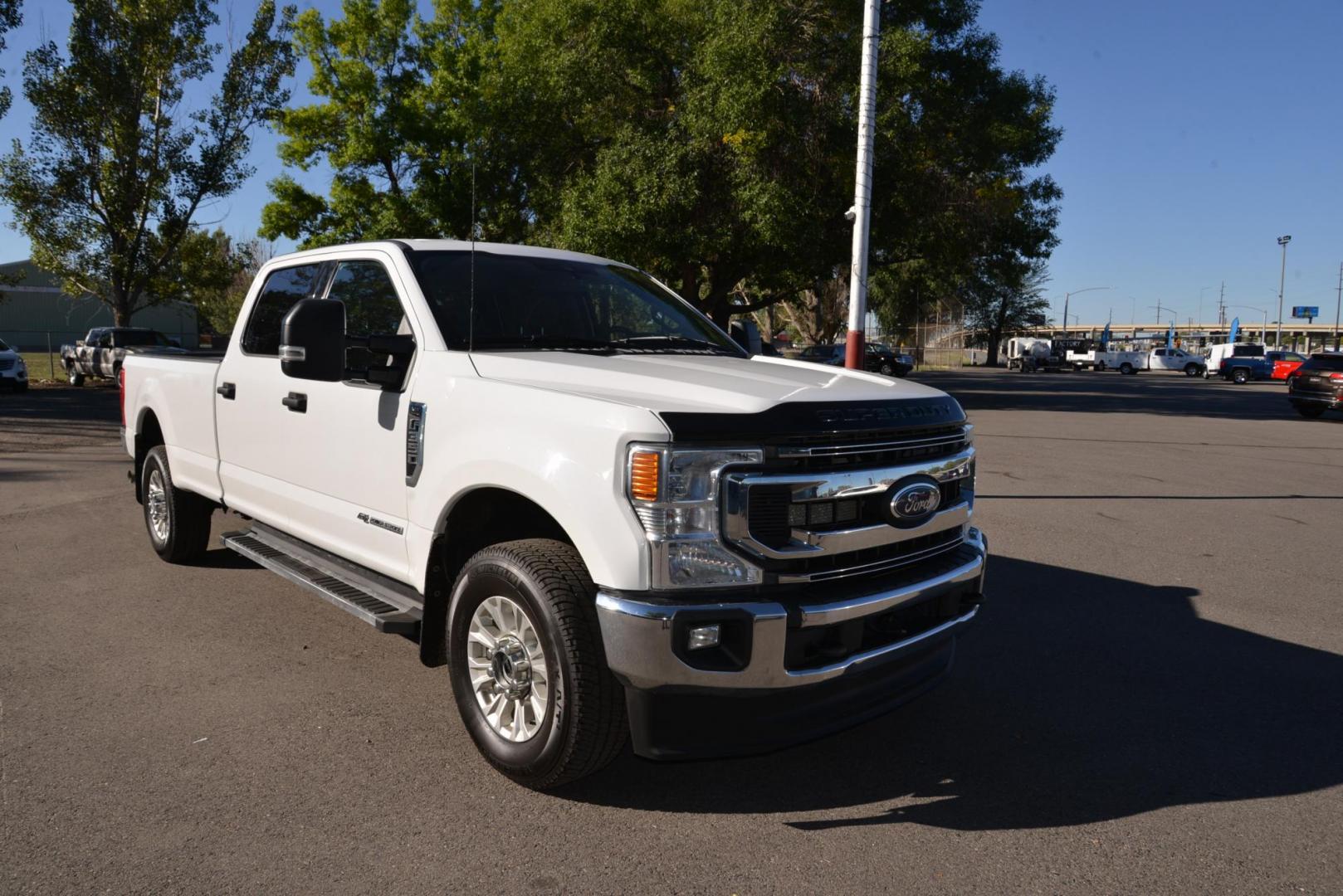 2021 Oxford White /Grey Ford F-350 SD XLT (1FT8W3BT4ME) with an 6.7L V8 OHV 16V DIESEL engine, 10 Speed Automatic transmission, located at 4562 State Avenue, Billings, MT, 59101, (406) 896-9833, 45.769516, -108.526772 - 2021 Ford F3 50 Super Duty Power Stroke Crew Cab 4x4 with an 8 foot bed it is a One Owner Diesel, there are no accidents recorded on the history report. The interior and exterior are very clean and the Ford runs and drives nicely. The tires are 18 inch Michelin LTX's and they are in next to new - Photo#12