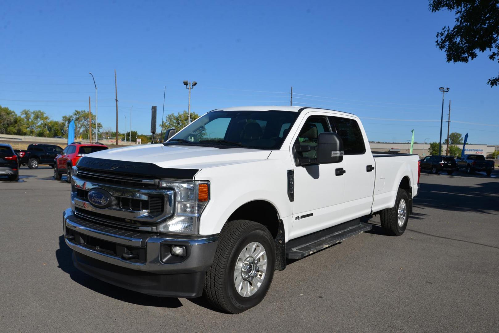 2021 Oxford White /Grey Ford F-350 SD XLT (1FT8W3BT4ME) with an 6.7L V8 OHV 16V DIESEL engine, 10 Speed Automatic transmission, located at 4562 State Avenue, Billings, MT, 59101, (406) 896-9833, 45.769516, -108.526772 - 2021 Ford F3 50 Super Duty Power Stroke Crew Cab 4x4 with an 8 foot bed it is a One Owner Diesel, there are no accidents recorded on the history report. The interior and exterior are very clean and the Ford runs and drives nicely. The tires are 18 inch Michelin LTX's and they are in next to new - Photo#3