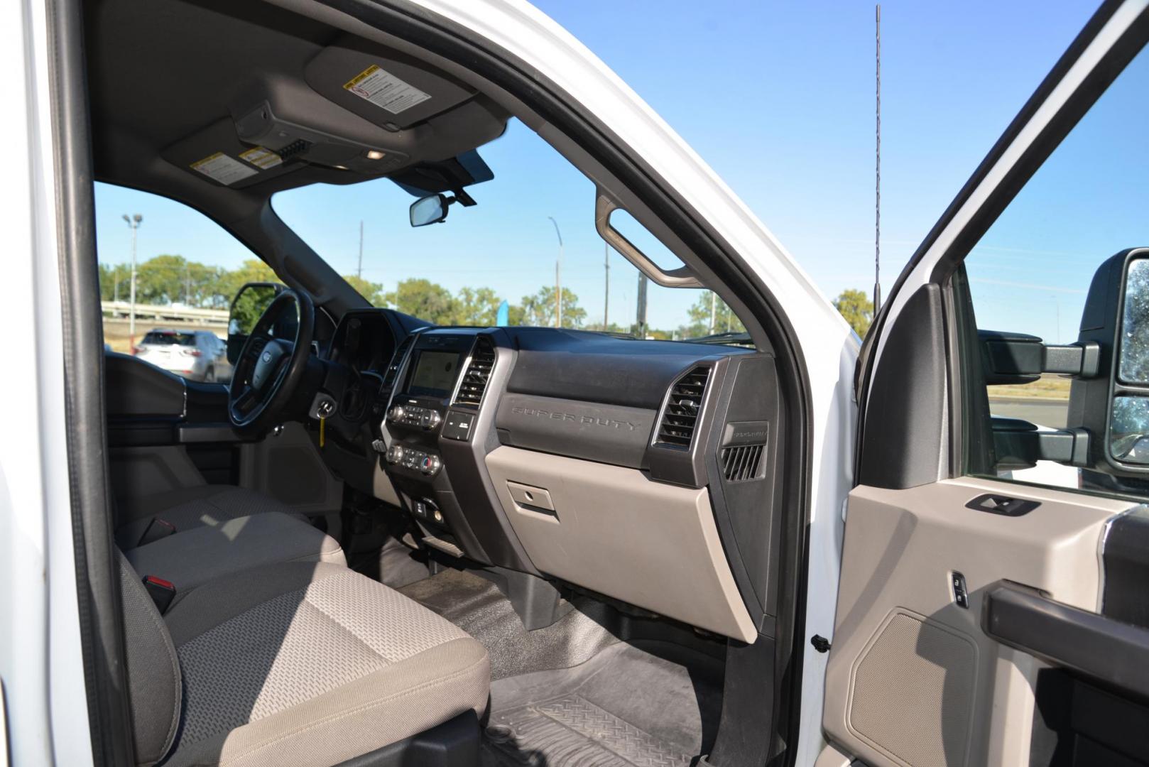 2021 Oxford White /Grey Ford F-350 SD XLT (1FT8W3BT4ME) with an 6.7L V8 OHV 16V DIESEL engine, 10 Speed Automatic transmission, located at 4562 State Avenue, Billings, MT, 59101, (406) 896-9833, 45.769516, -108.526772 - Photo#28